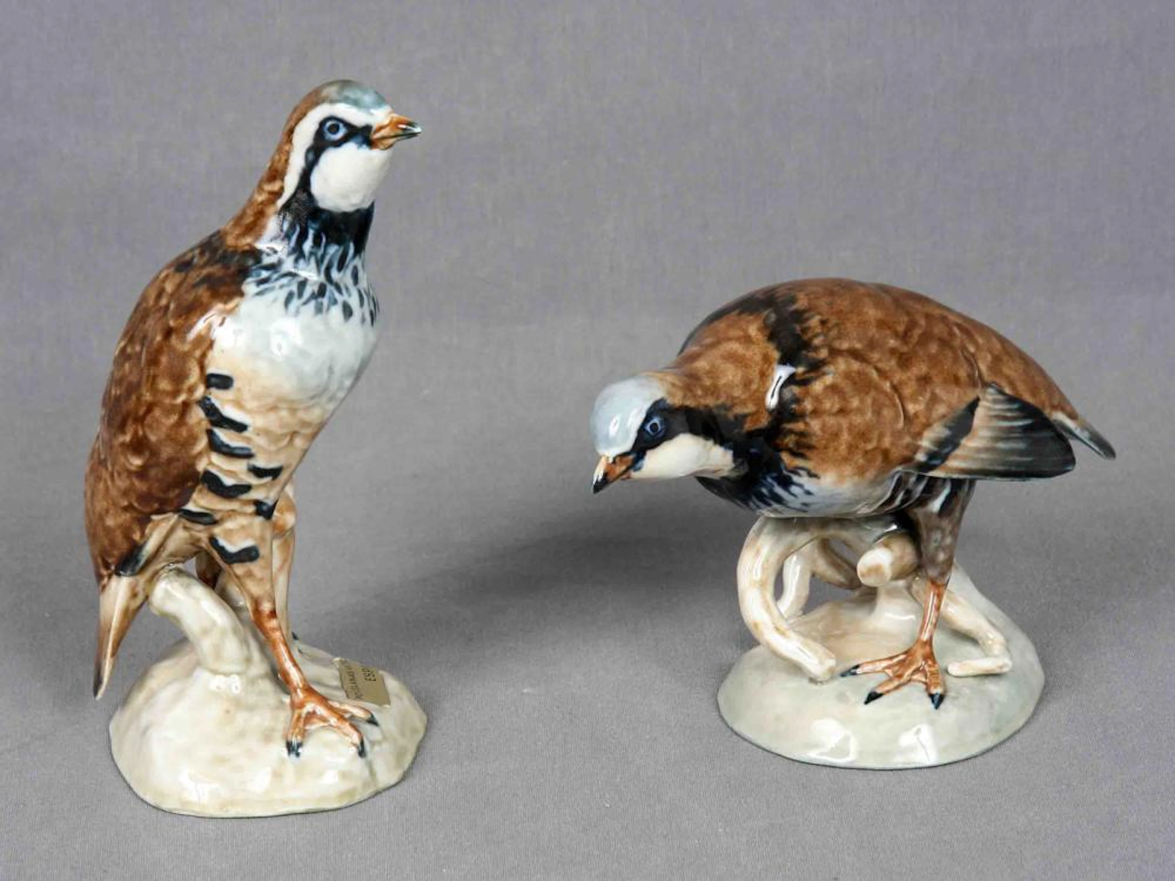 Lote formado por dos perdices . En porcelana españ