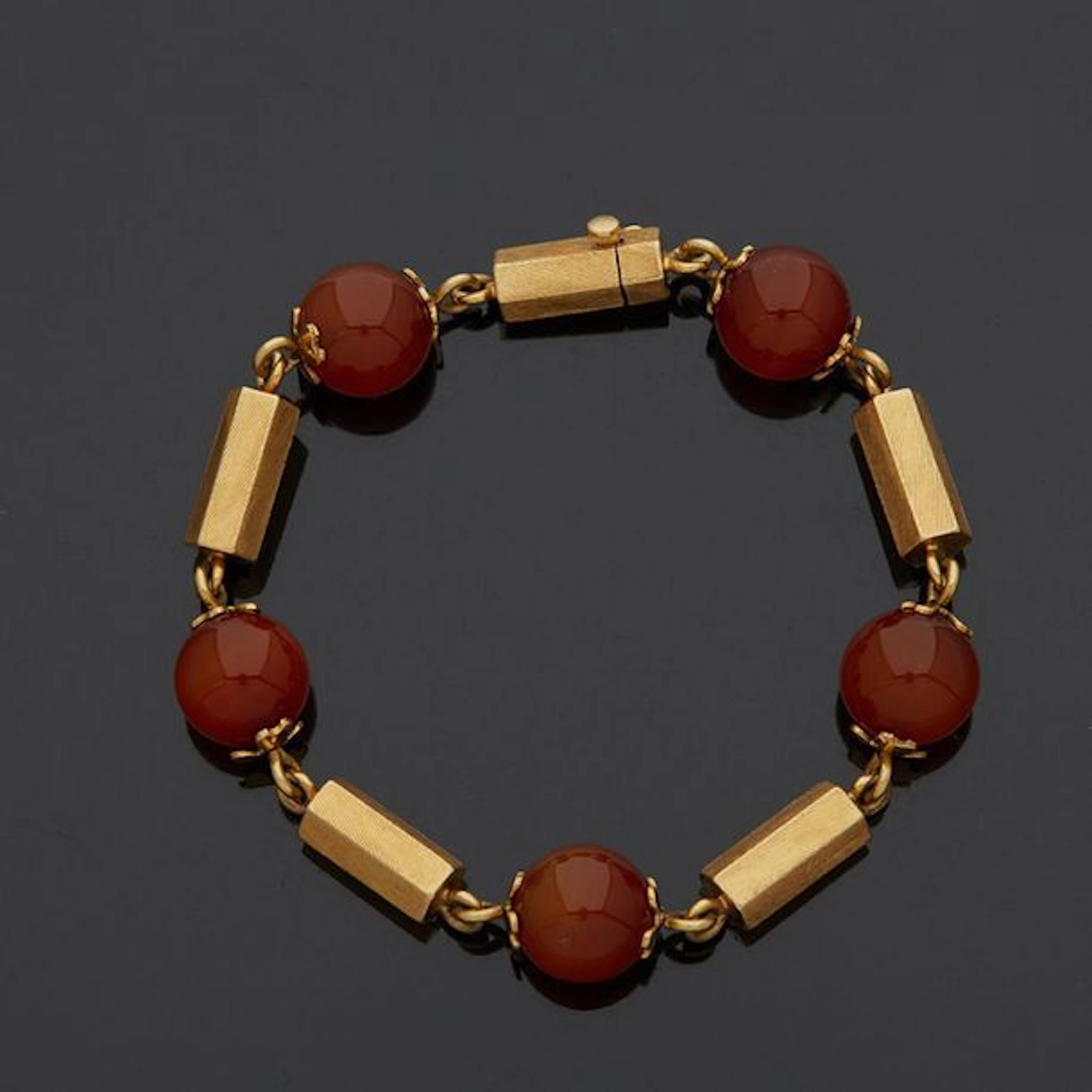 Bracelet en or jaune 18K (750) et perles...