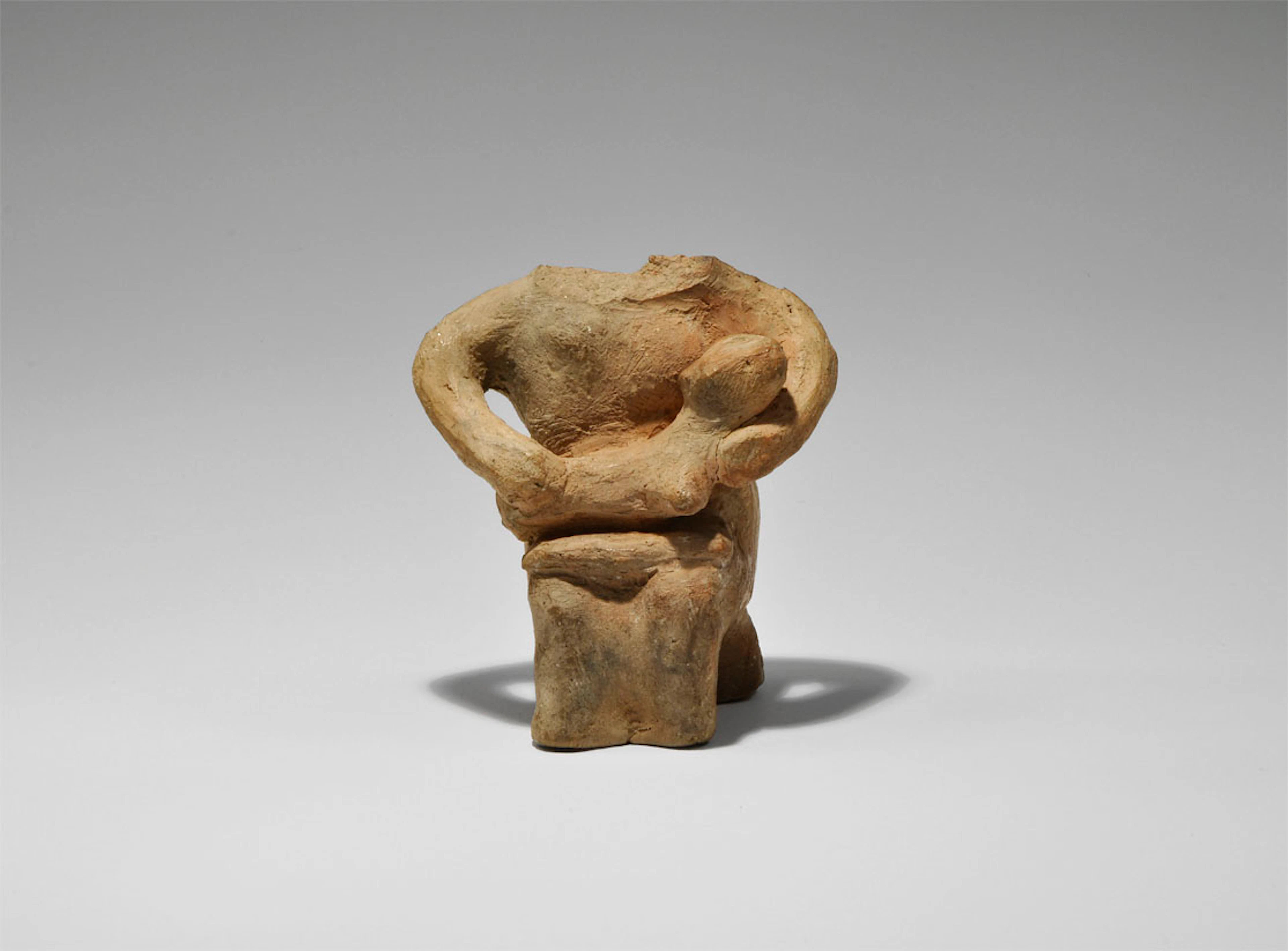 Neolithic Ceramic Vinca Seated Mother and Child Figure