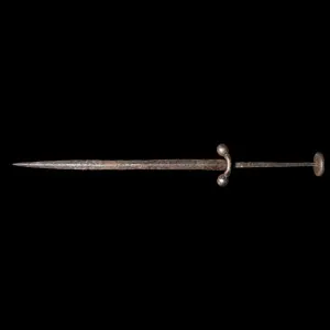 An iron left-handed dagger composed of a slender lozengiform blade ...