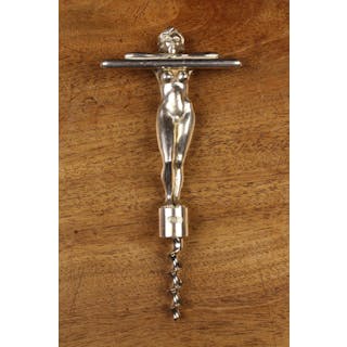 A Silver Figural Corkscrew in the from of a naked lady...