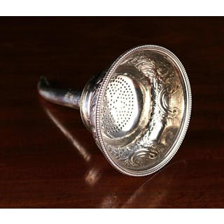 A George III Silver Three-part Wine Funnel with sieve