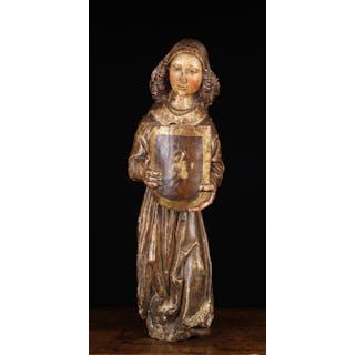 A 16th Century Polychromed Wood Carving of an Angel