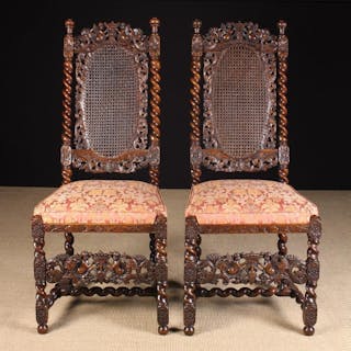 A Pair of Exceptional William & Mary Carved Walnut Side Chairs
