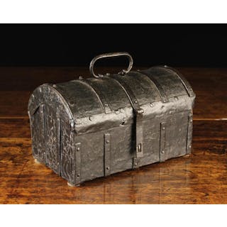 A 16th/17th Century French Leather Clad Dome-Topped Casket bound in iron straps