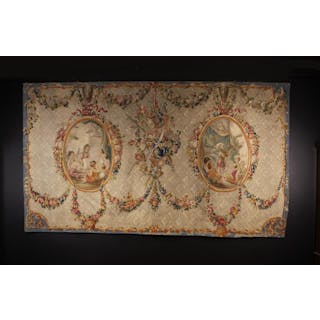 An 18th Century French Aubusson Tapestry woven with a hanging trophy of flowers
