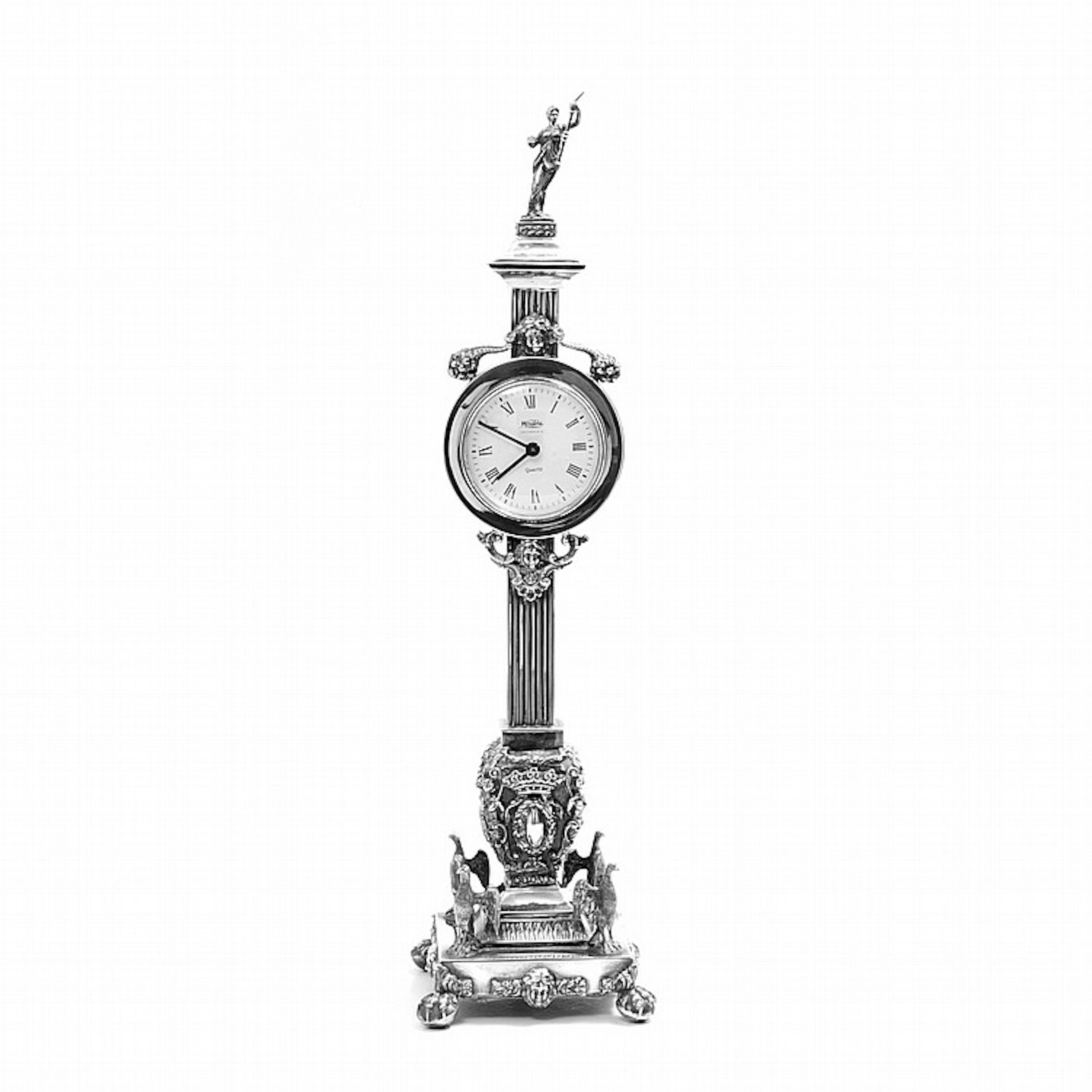 A SILVER TABLE CLOCK