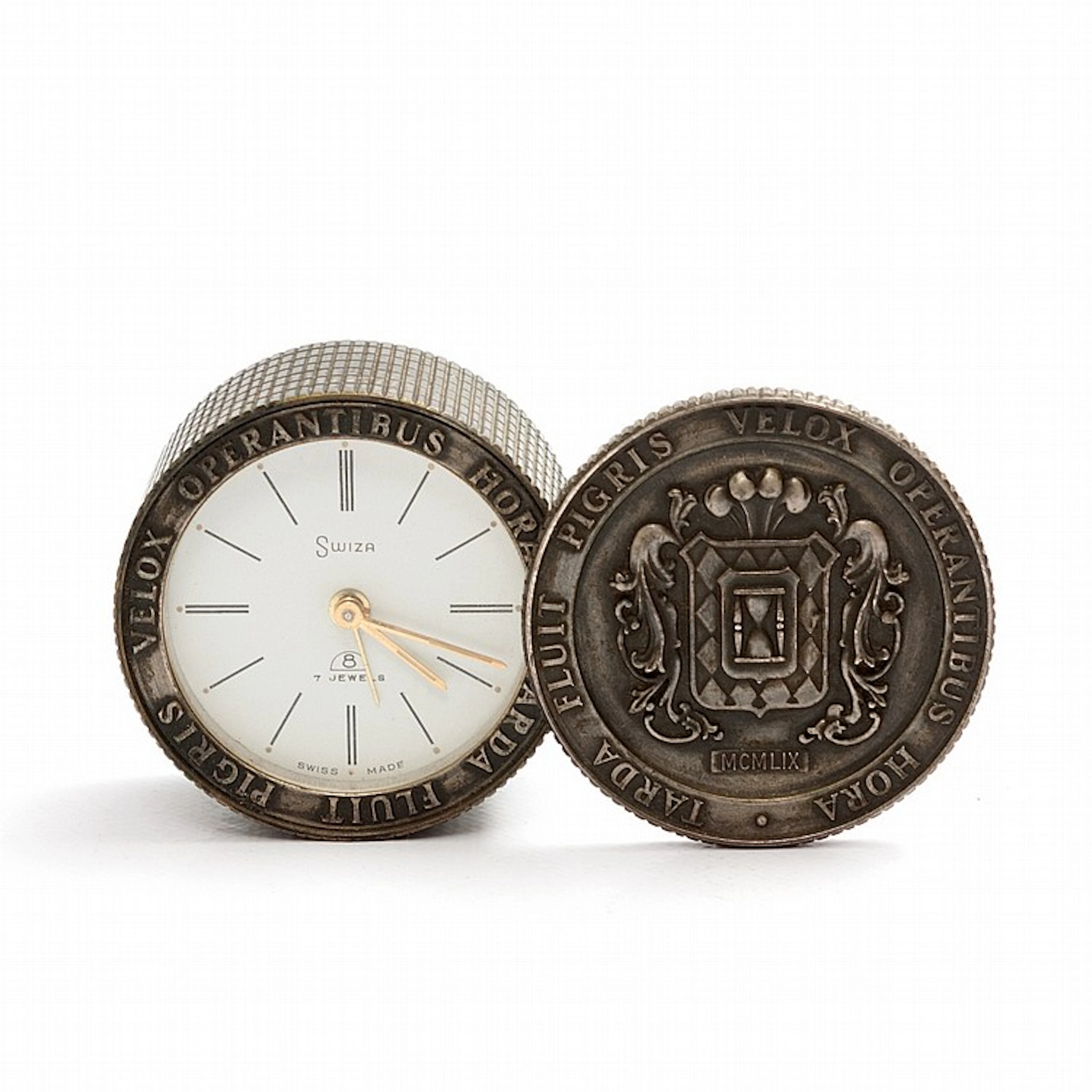 A SILVER-PLATED ALARM CLOCK