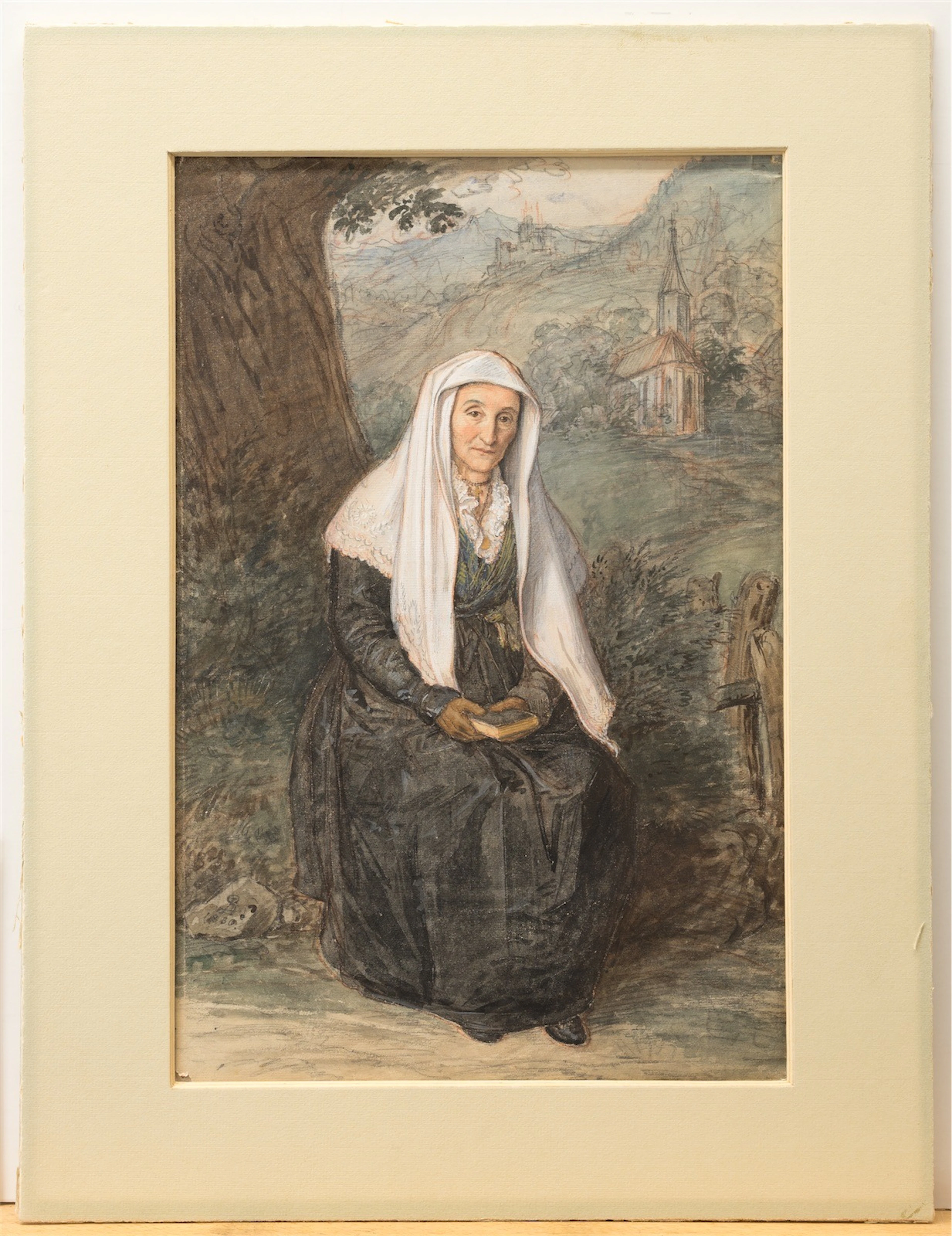 LUDWIG FERDINAND SCHNORR VON CAROLSFELD (1788 KÖNIGSBERG I. PR. - 1853 WIEN). Kirchgängerin mit Gebetbuch in alpenländischer Tracht am Wegesrand, im Hintergrund eine Kapelle. Deck- und Wasserfarben üb
