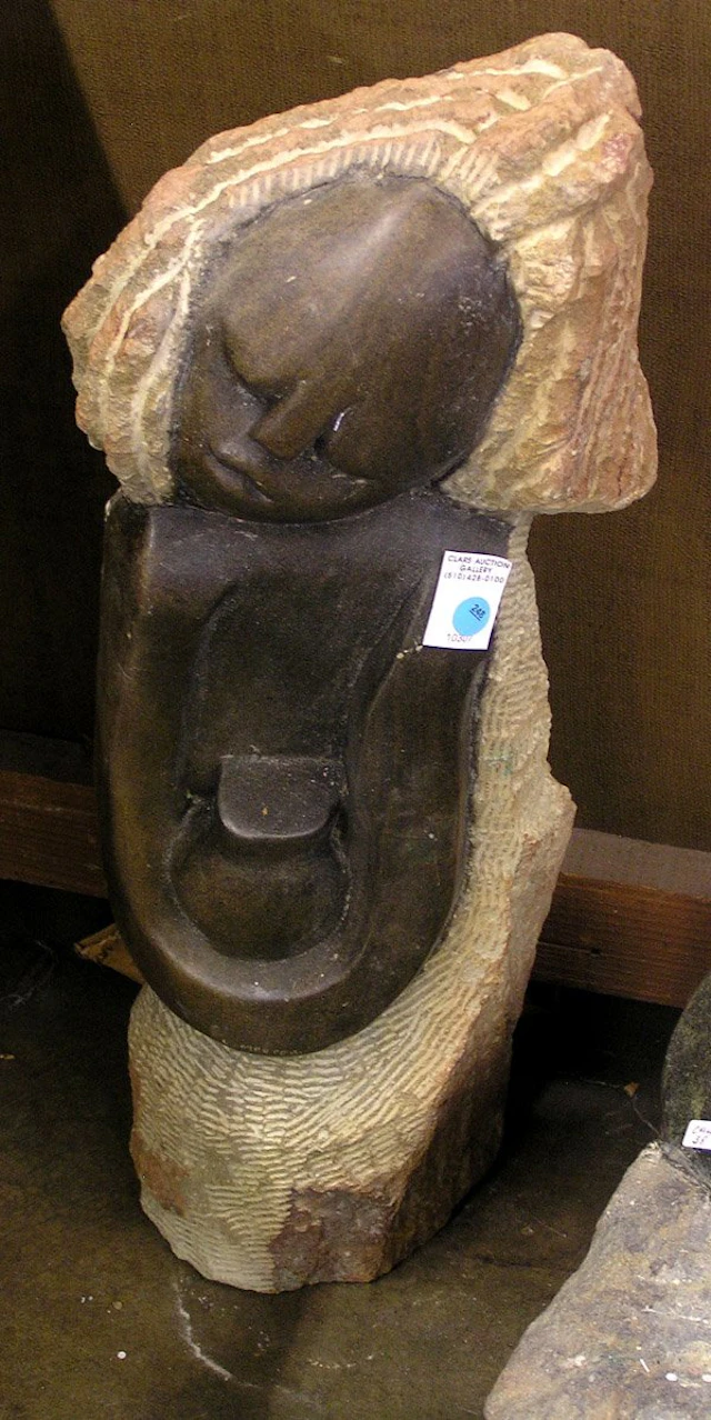 4169: Zimbabwe carved serpentine sculpture