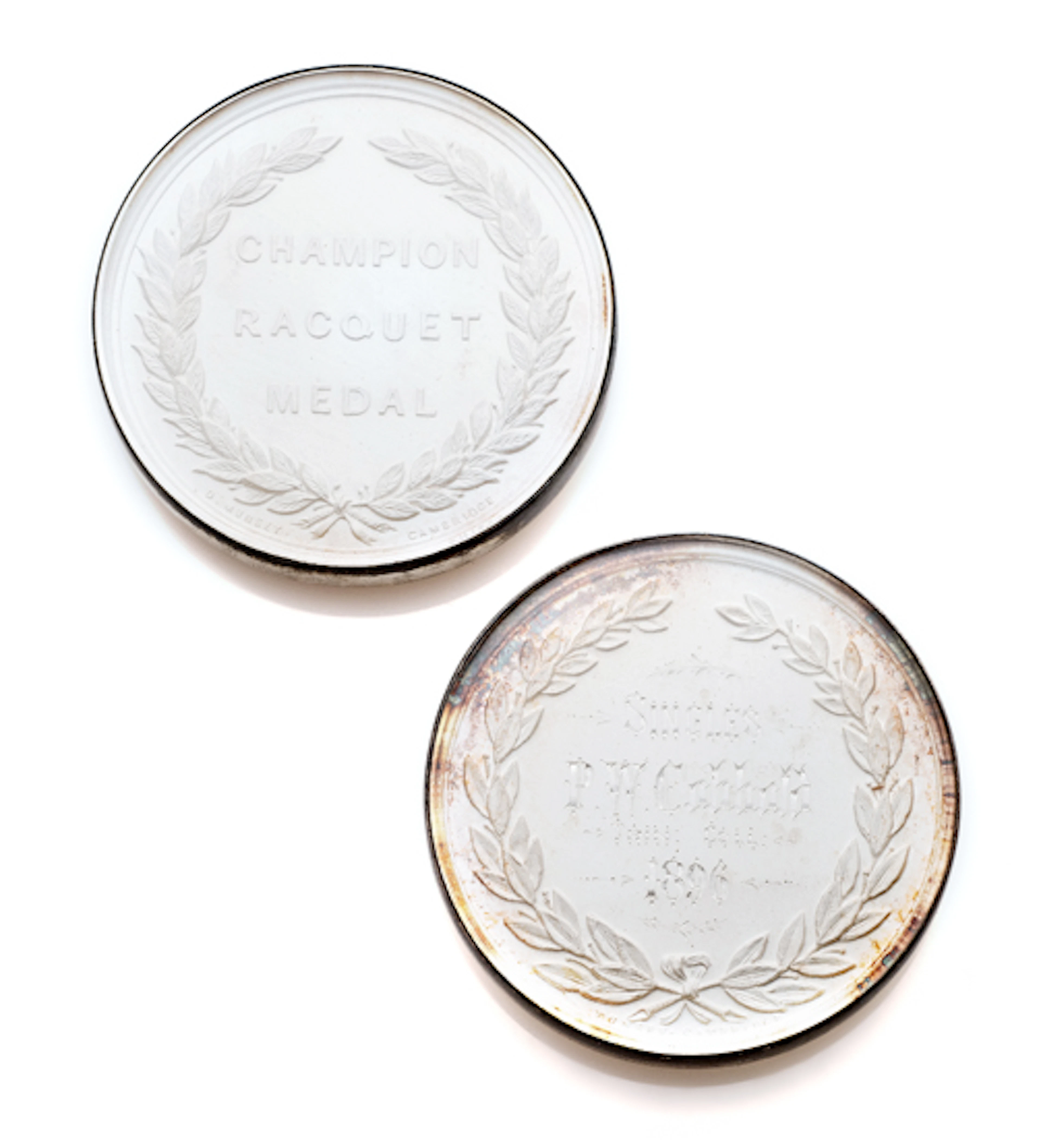 A pair of Cambridge University Championship Racquet Medals awarded to Phili