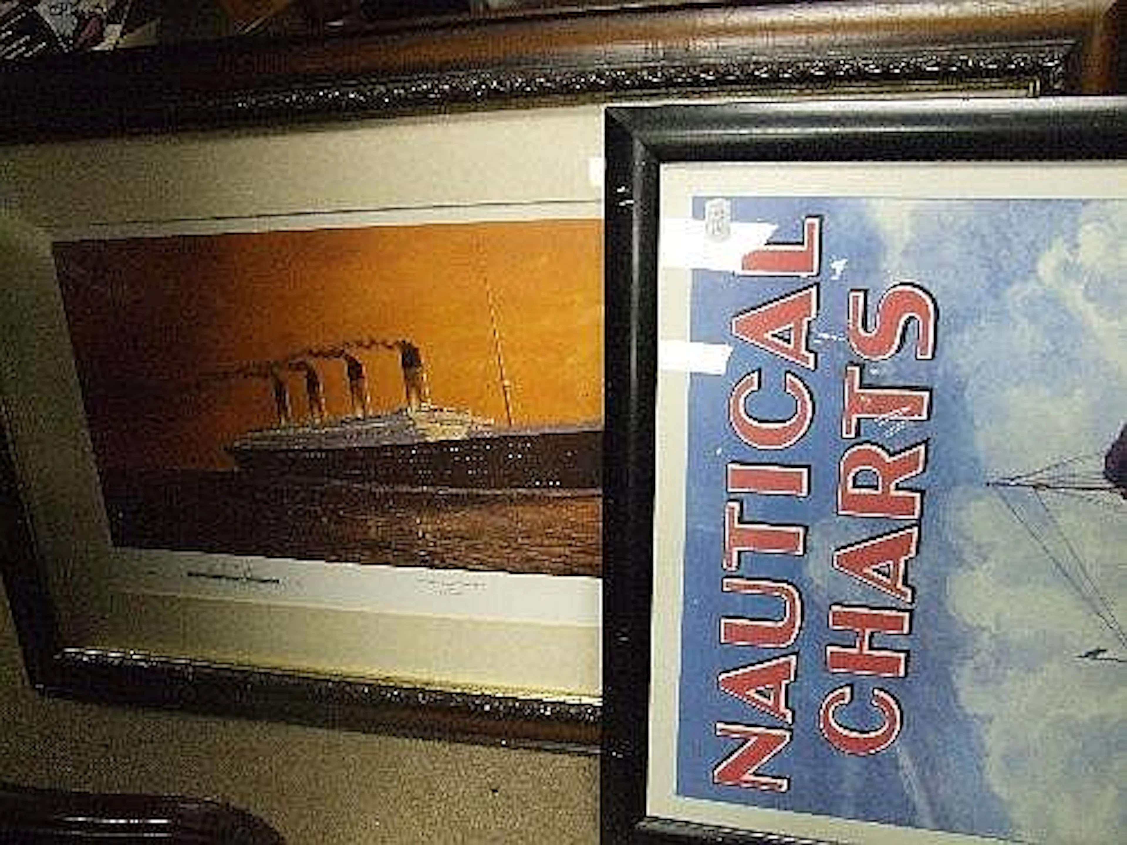 A modern reproduction nautical charts poster and a