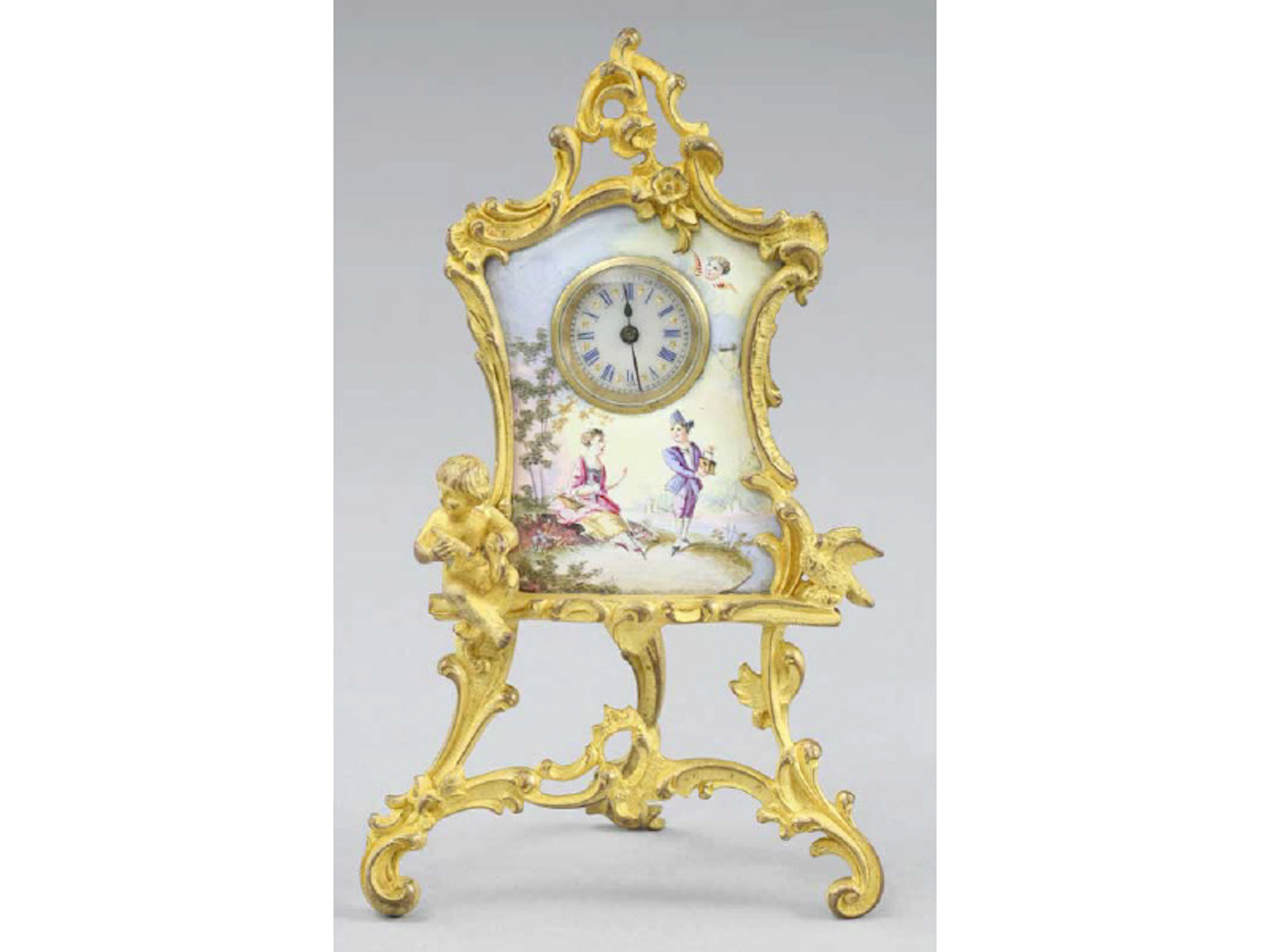 A miniature Limoges enamel boudoir clock in an