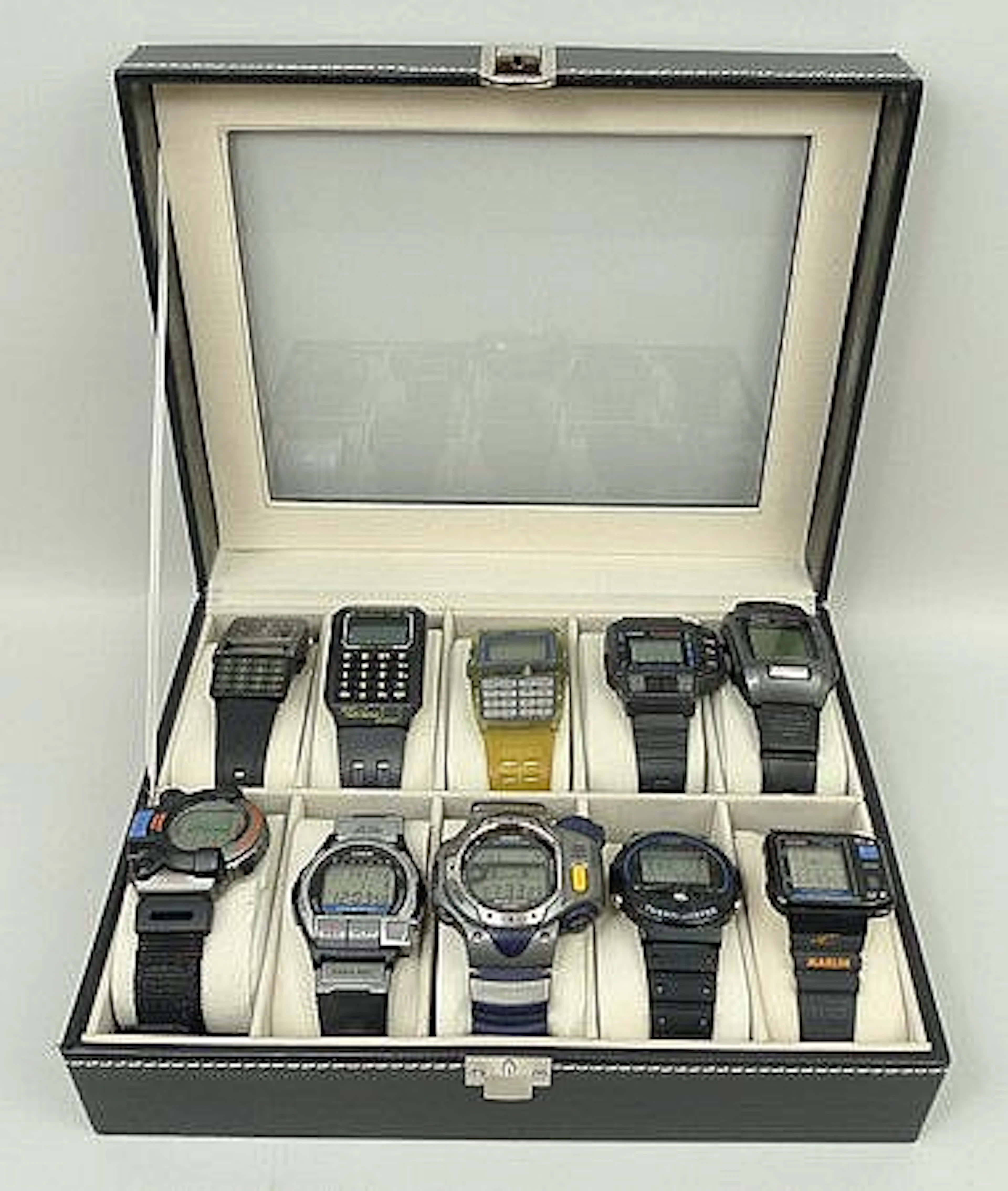 A quantity of Casio LCD watches, some with calcula