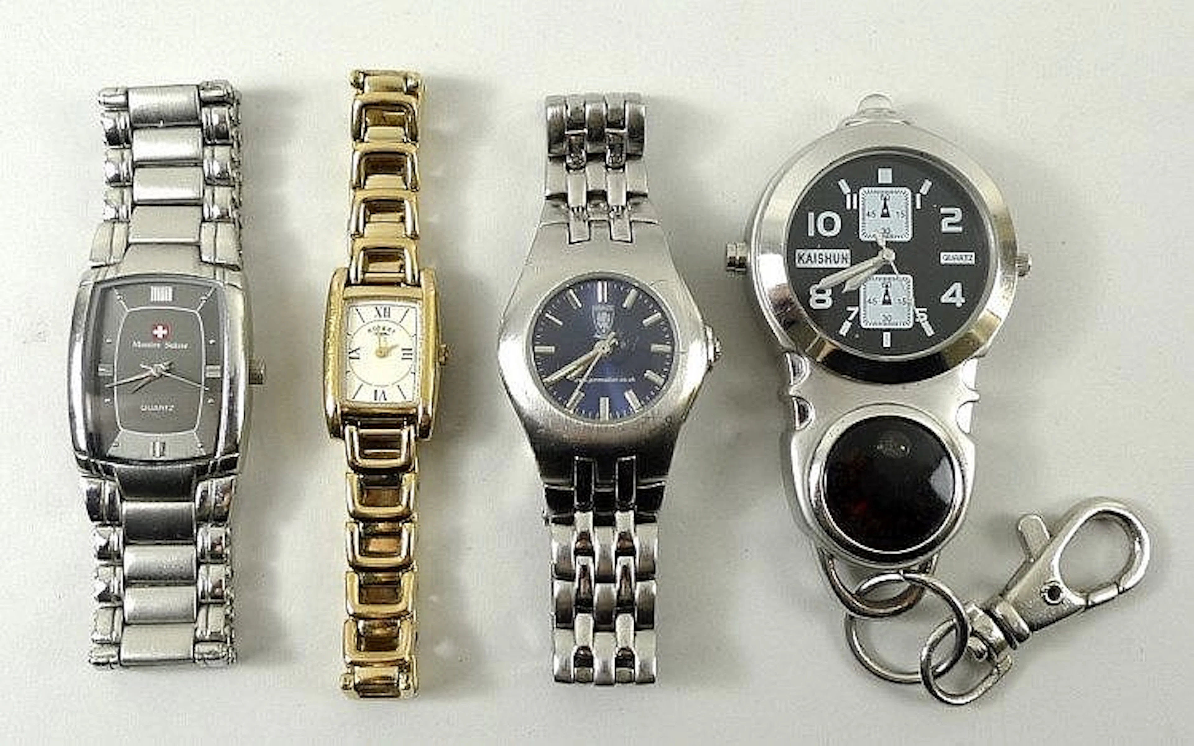 A collection of watches comprising a Montre Suisse Quartz wristwatch