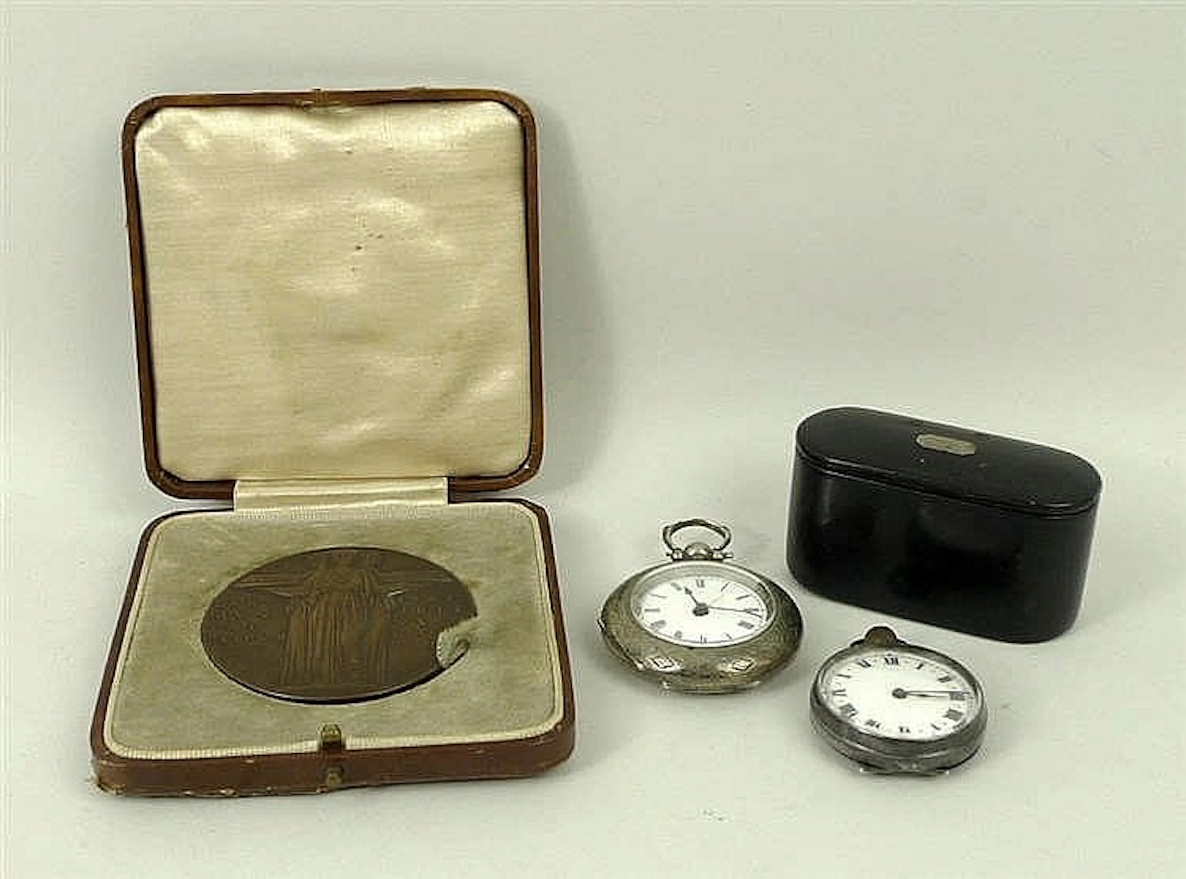 A medal 'For Service in National Emergency, May 1926', with seated helmeted