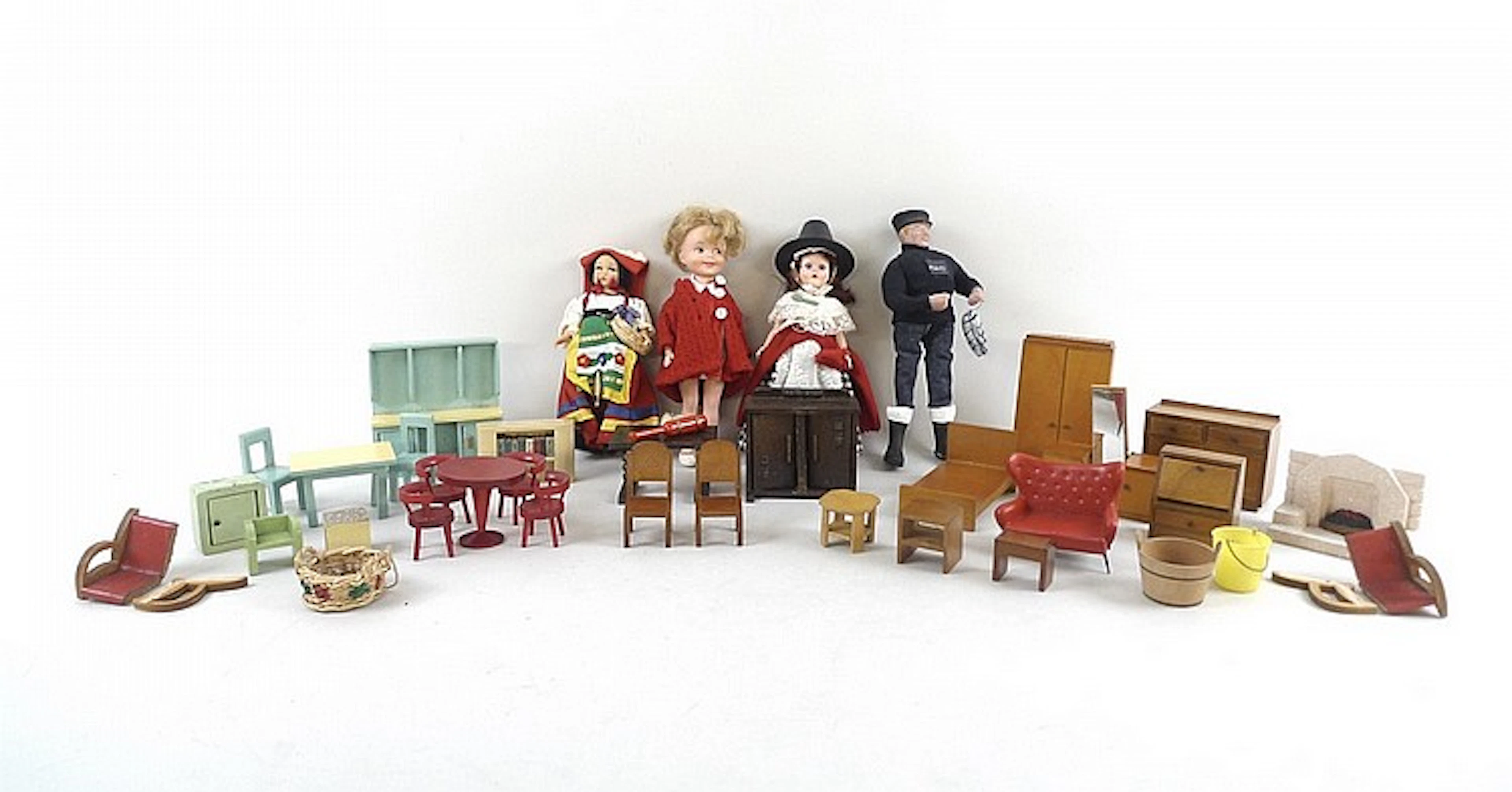 A quantity of vintage dolls house furniture