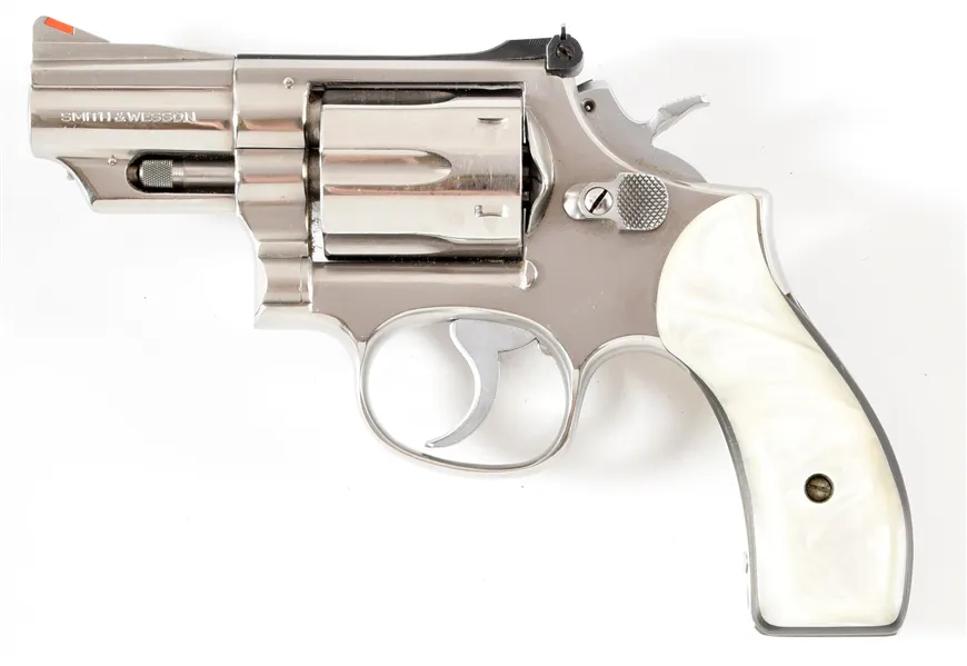 Round barrel with a ramp front sight and micrometer adjustable rear ...