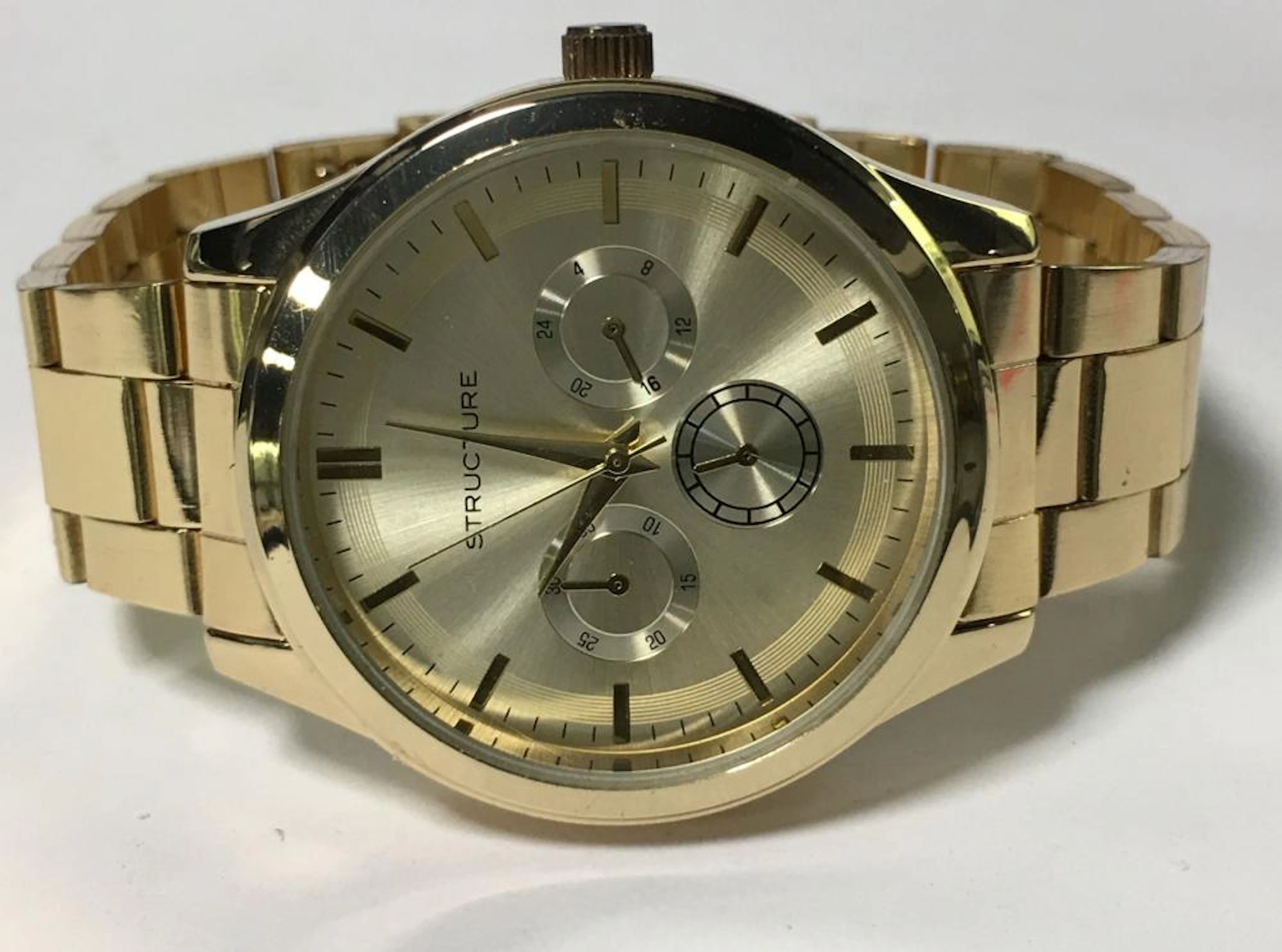 Structure Goldtone Wrist Watch In Case