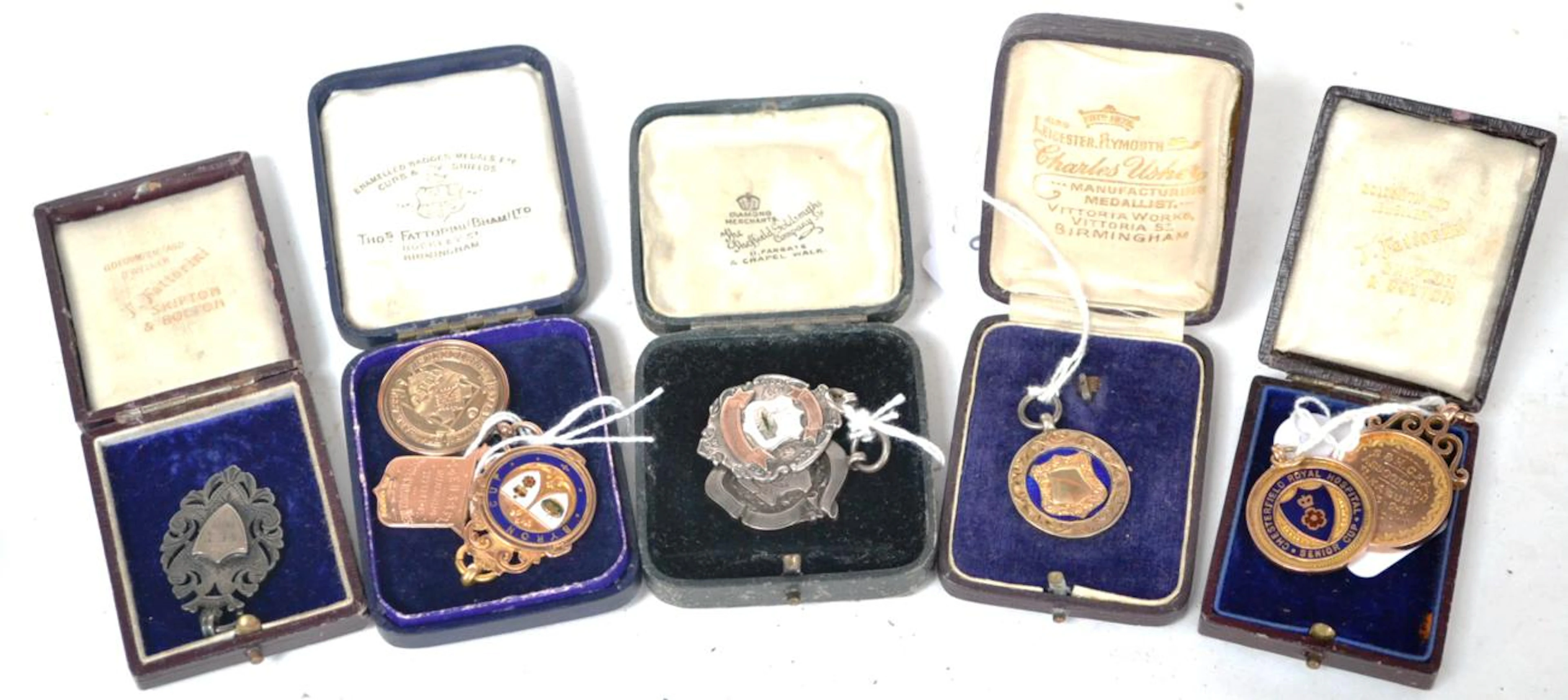 A Collection of Nine Football Medallions Awarded to Ernest `Nudger' Needham
