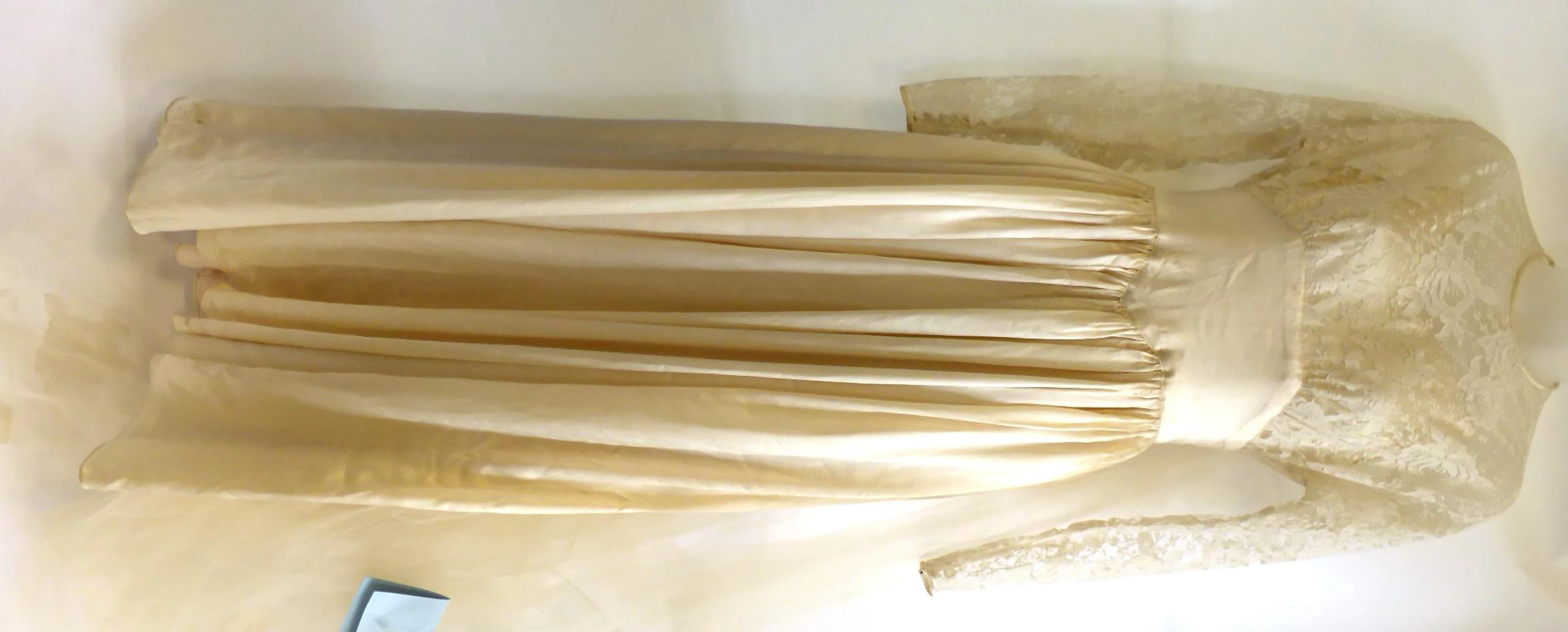 Late 1950s Wedding Dress with cream lace mounted bodice and long sleeves