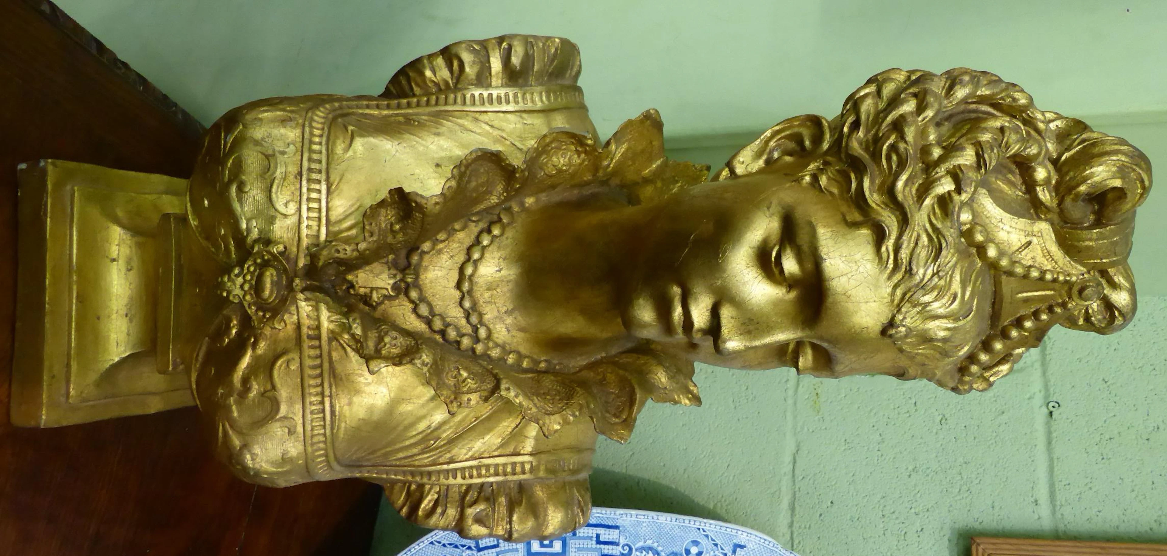 A gilt bust of Empress Eugene