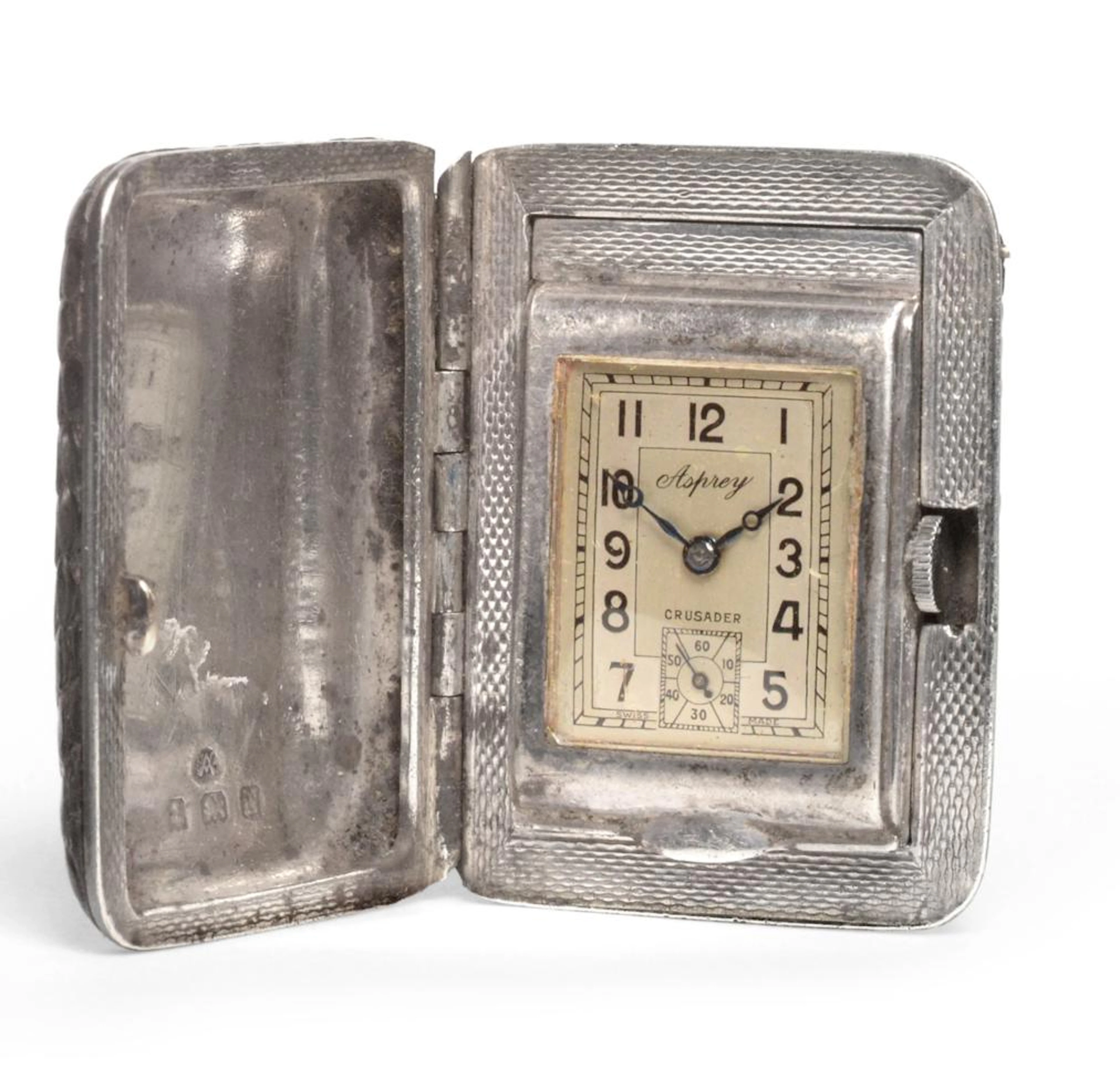 A Silver and Leather Purse Watch