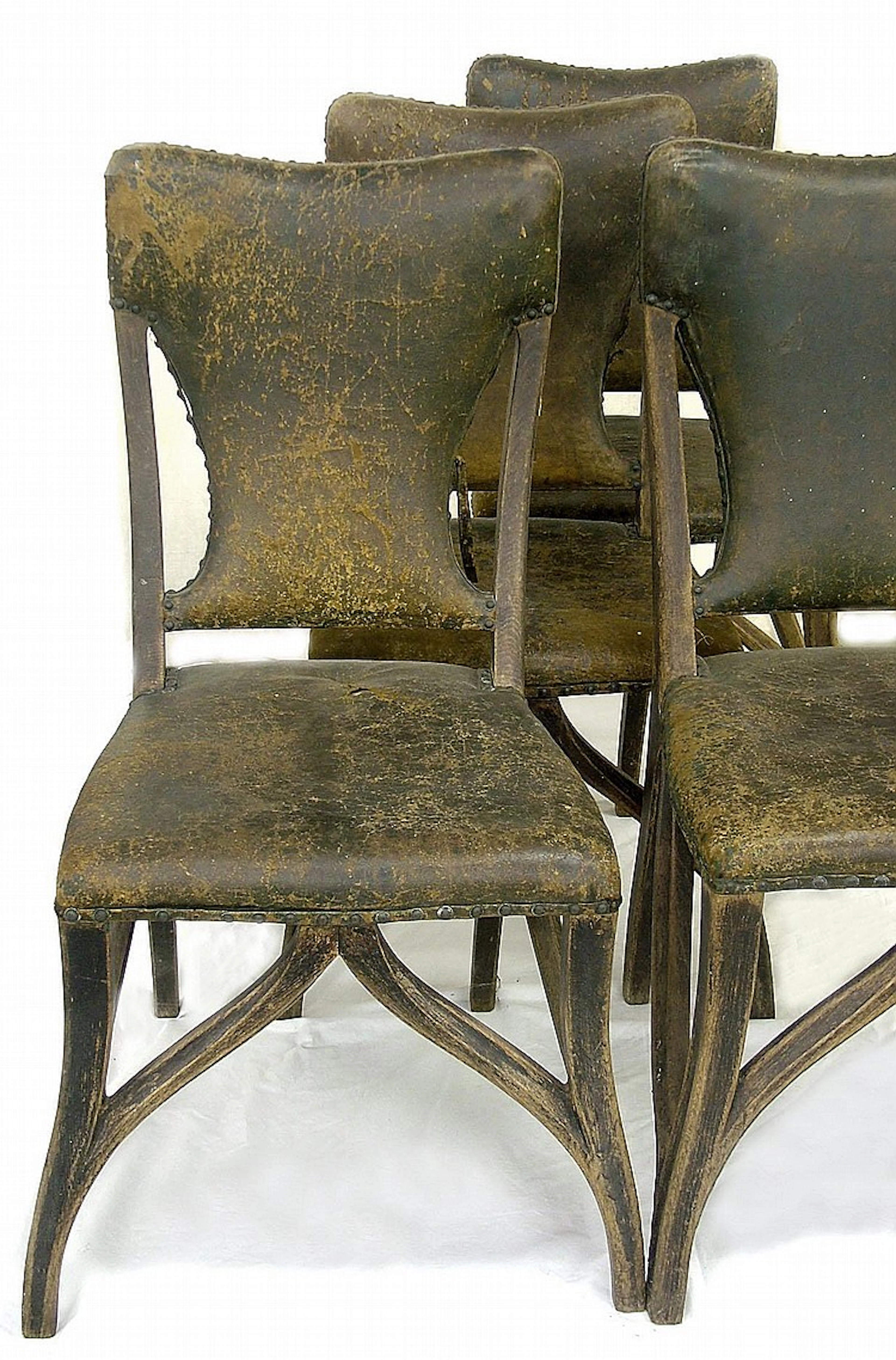 Set of five French Art Nouveau oak and leather