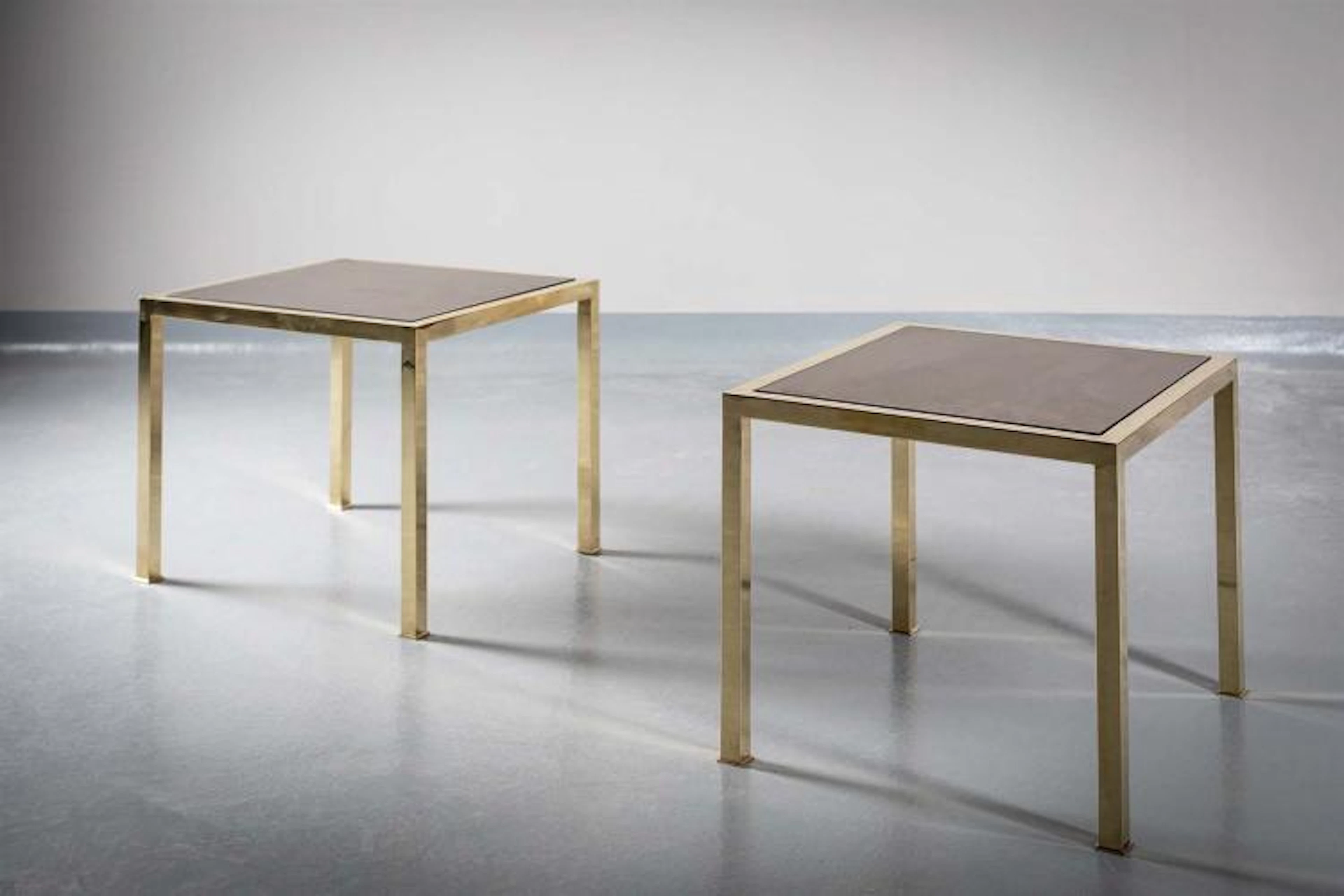 A PAIR OF GILT BRASS LOW TABLES