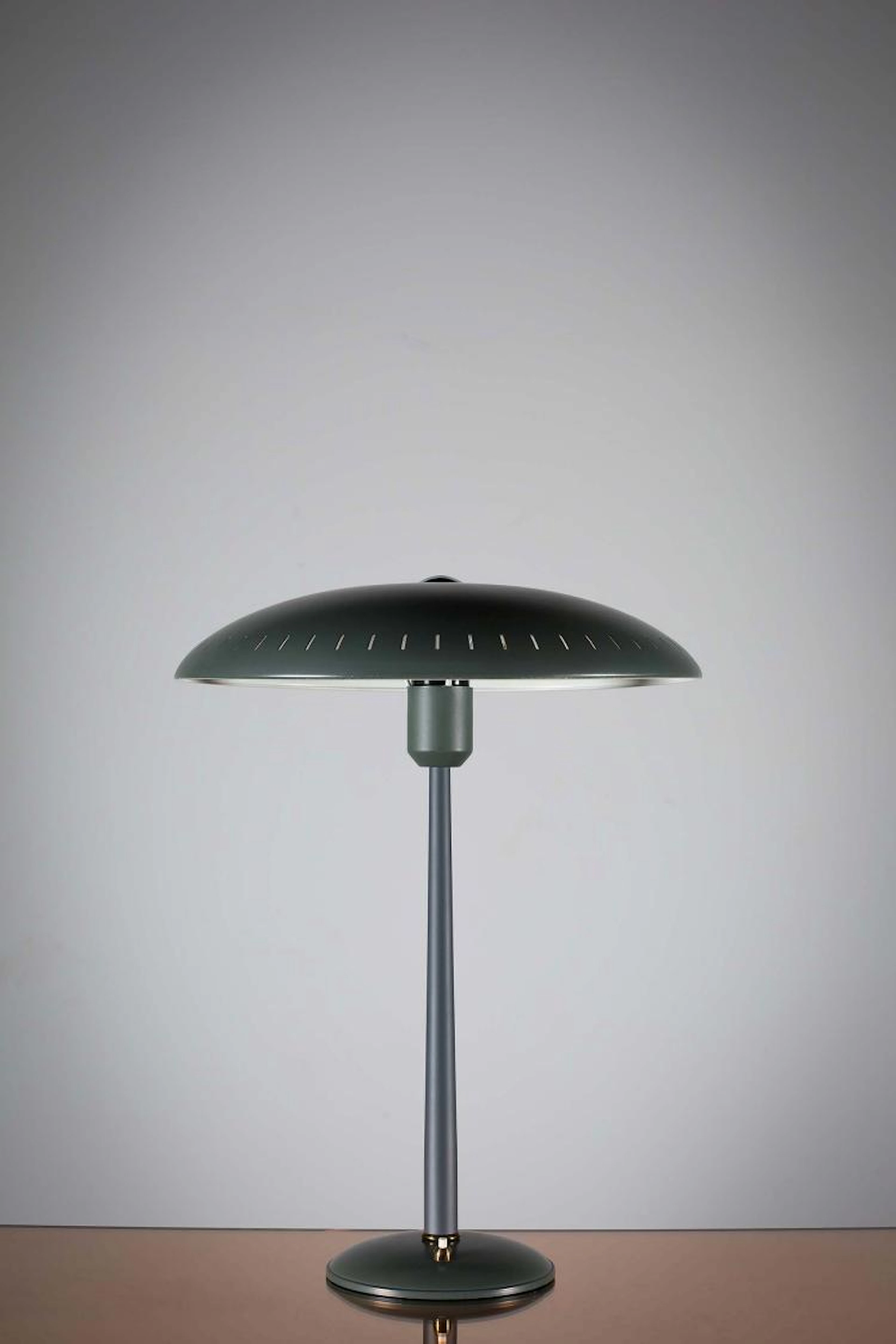 A DESK LAMP, BY LOUIS KALFF FOR PHILIPS, on circular base, 52cm (h)