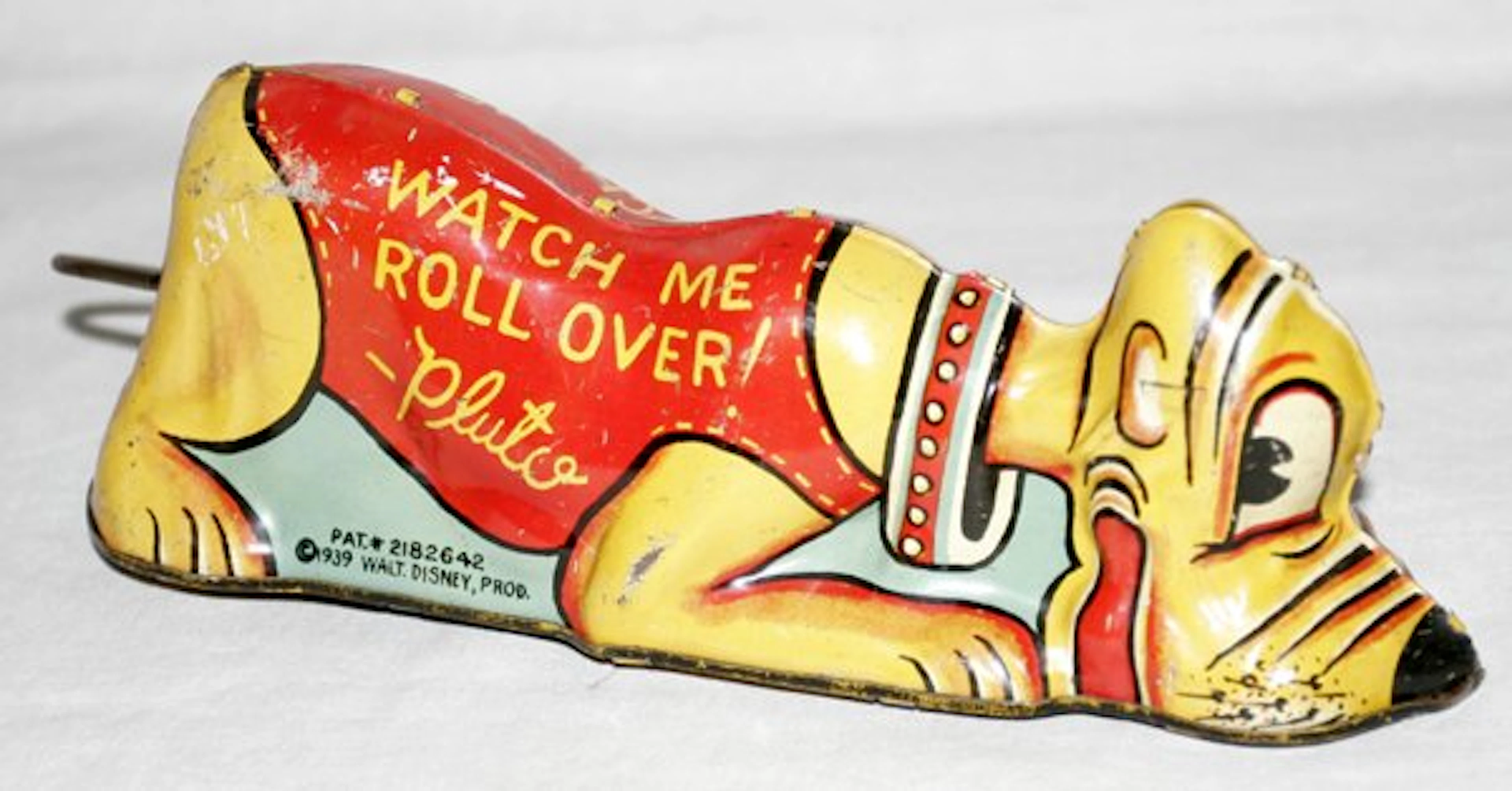 030303: LOUIS MARX DISNEY TIN ROLL OVER PLUTO WIND-UP