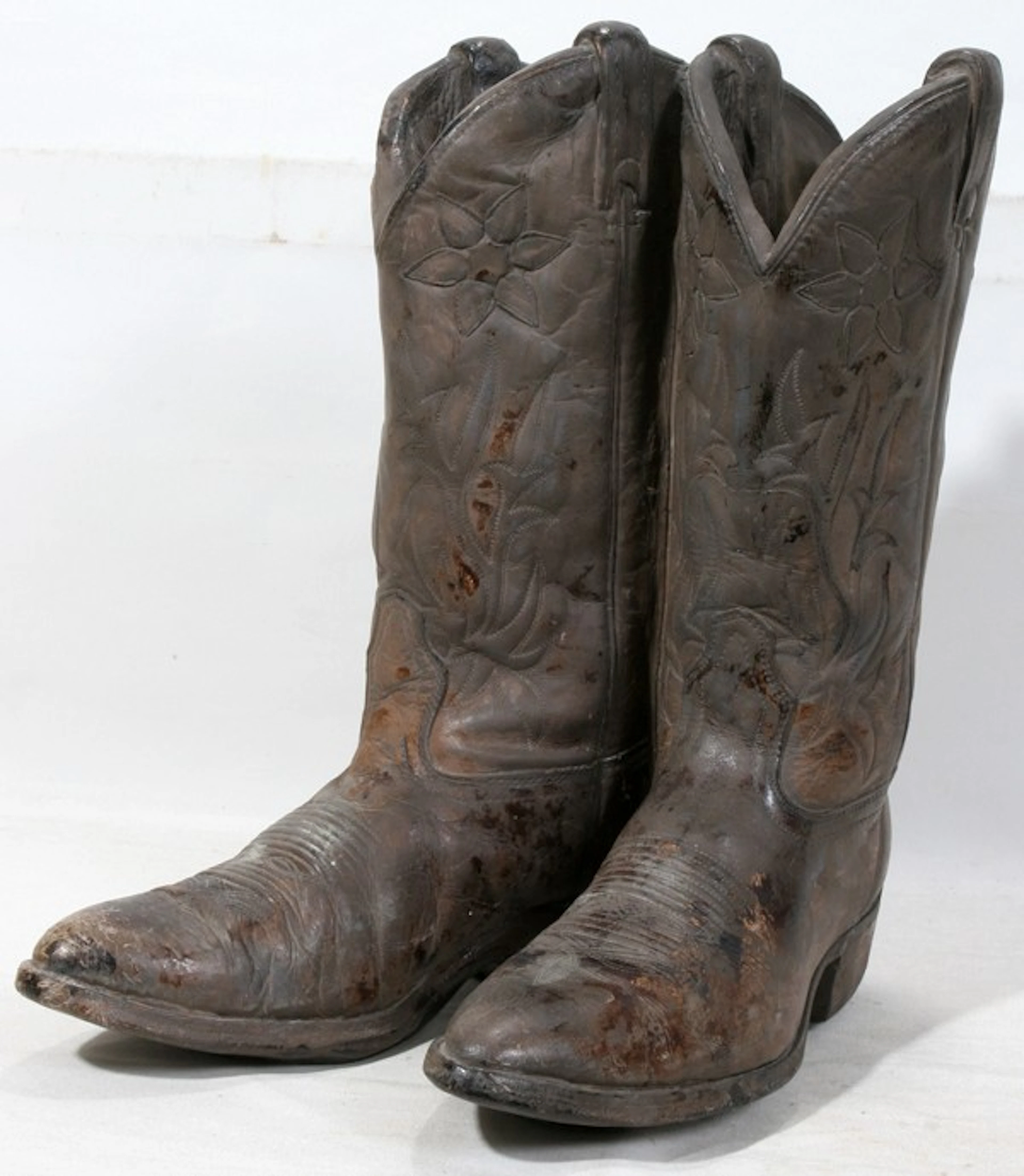 050396: JAMES MARSHAL CAST METAL COWBOY BOOT SCULPTURE