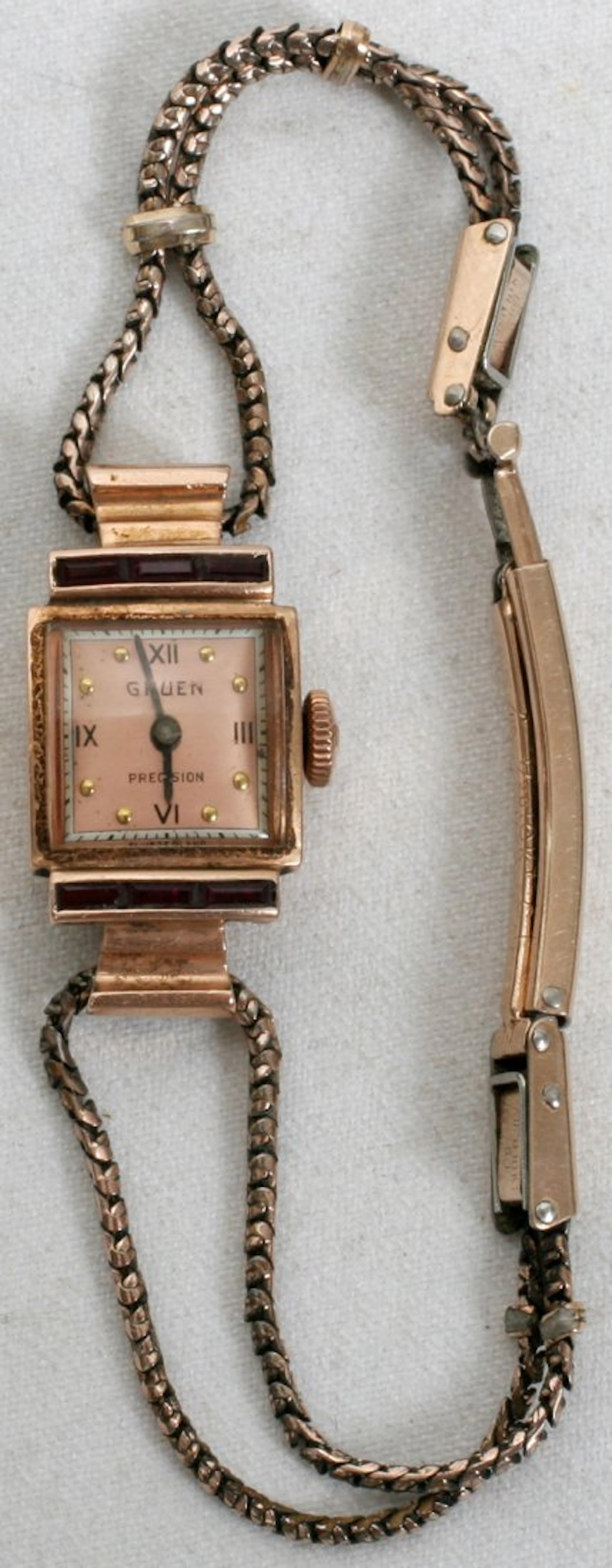 GRUEN GOLD WRIST WATCH W/SIX RUBIES GOLD FILLEDBAND