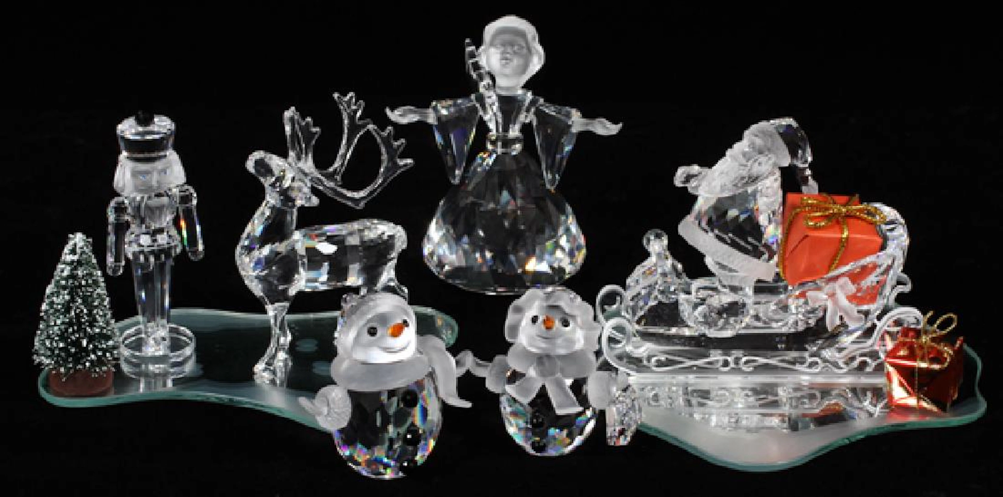 SWAROVSKI CRYSTAL HOLIDAY FIGURINES 8 PIECES