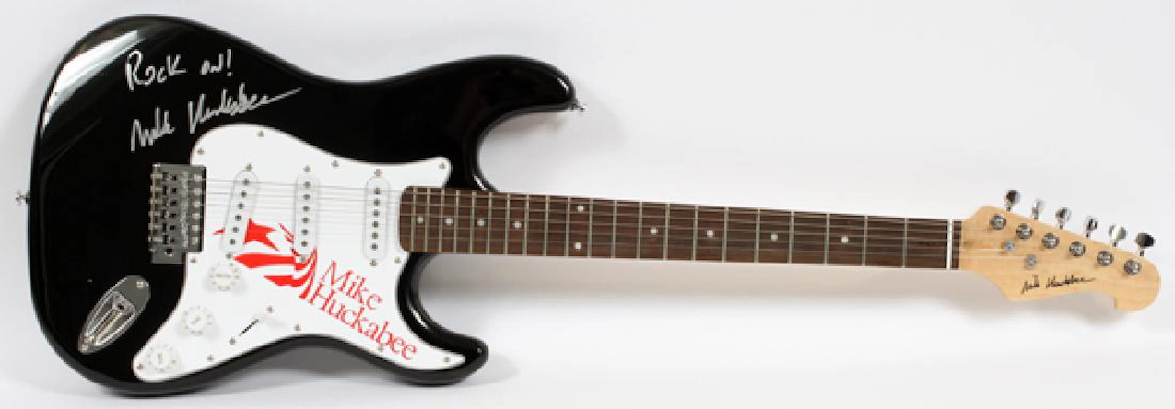 Mike huckabee signed guitar, l 38 1/2''