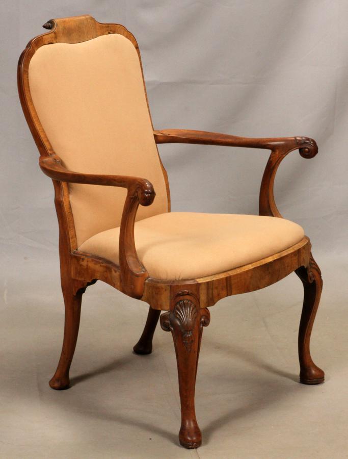 Queen anne style carved walnut open arm chair