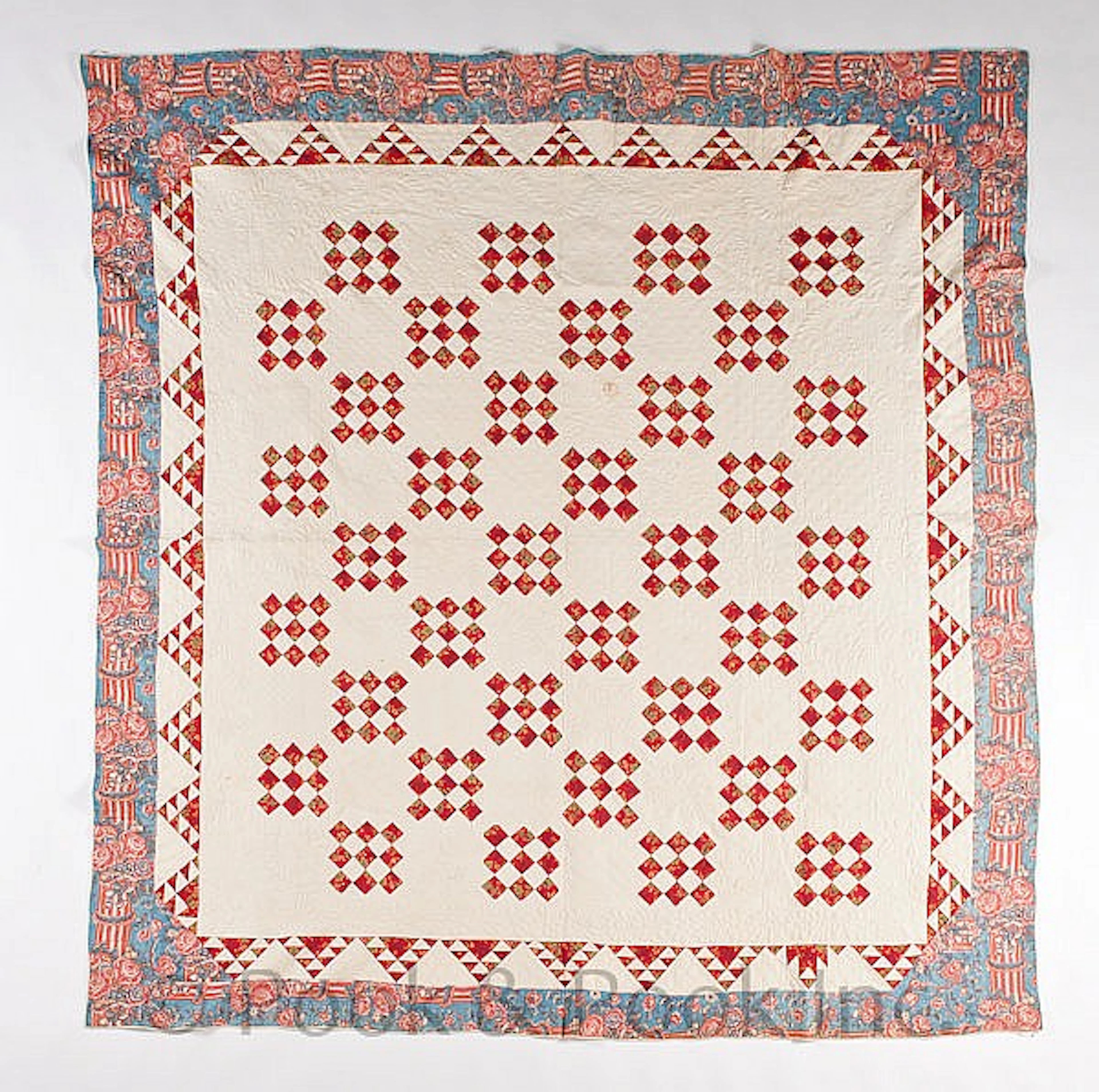 Pieced and trapunto quilt with nine-piece checker