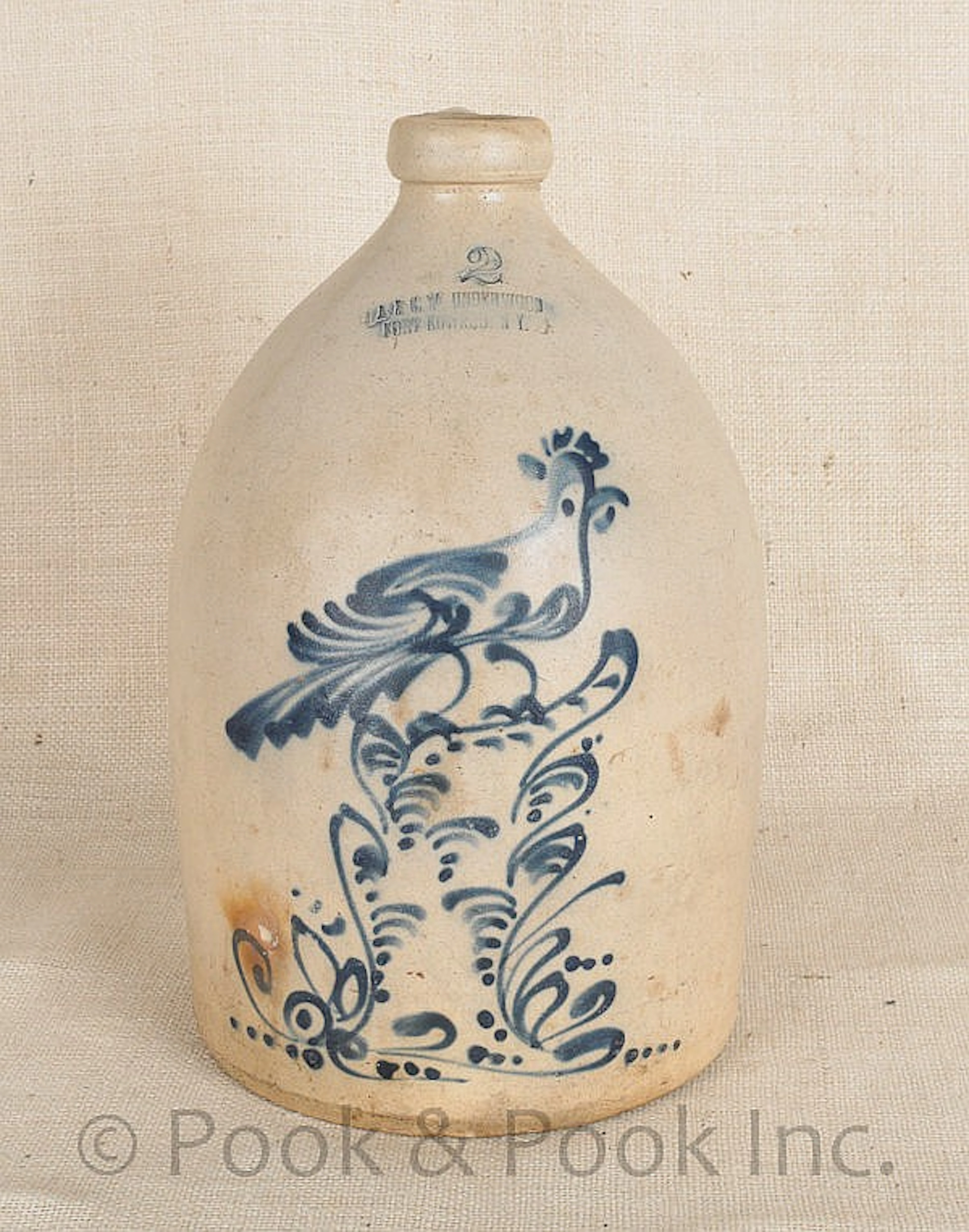 Two-gallon stoneware jug, 19th c., stamped JA & CW
