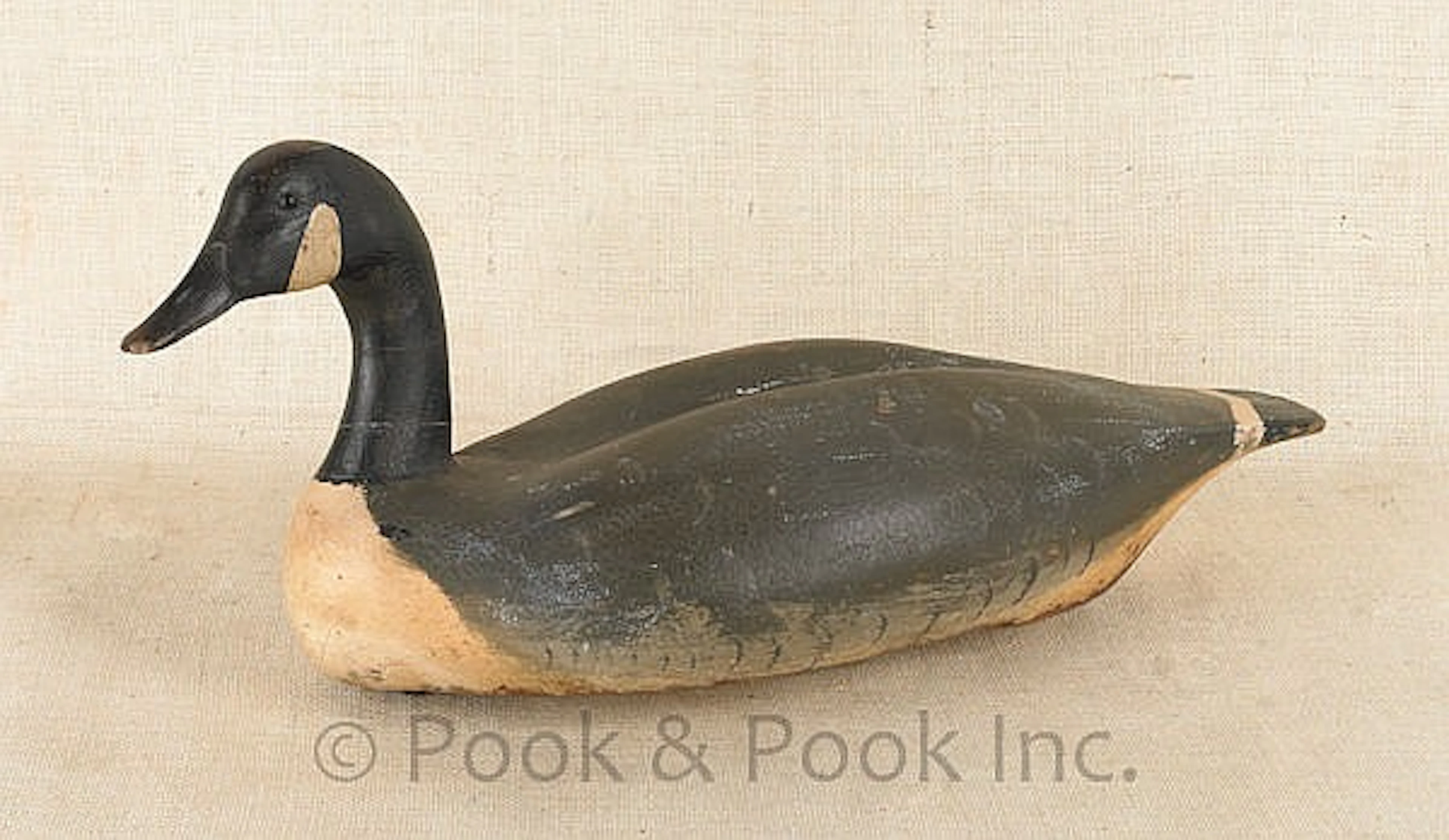 Carved and painted Canada goose decoy, early 20th