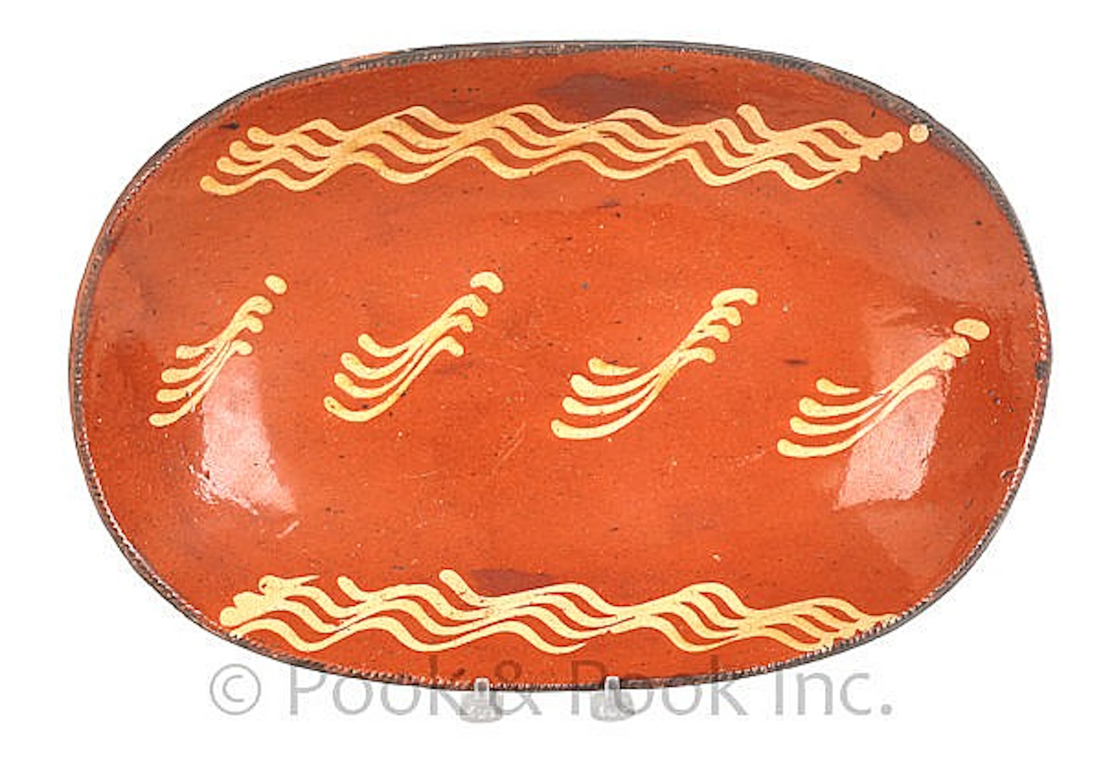 Pennsylvania redware loaf dish, 19th c., with slip