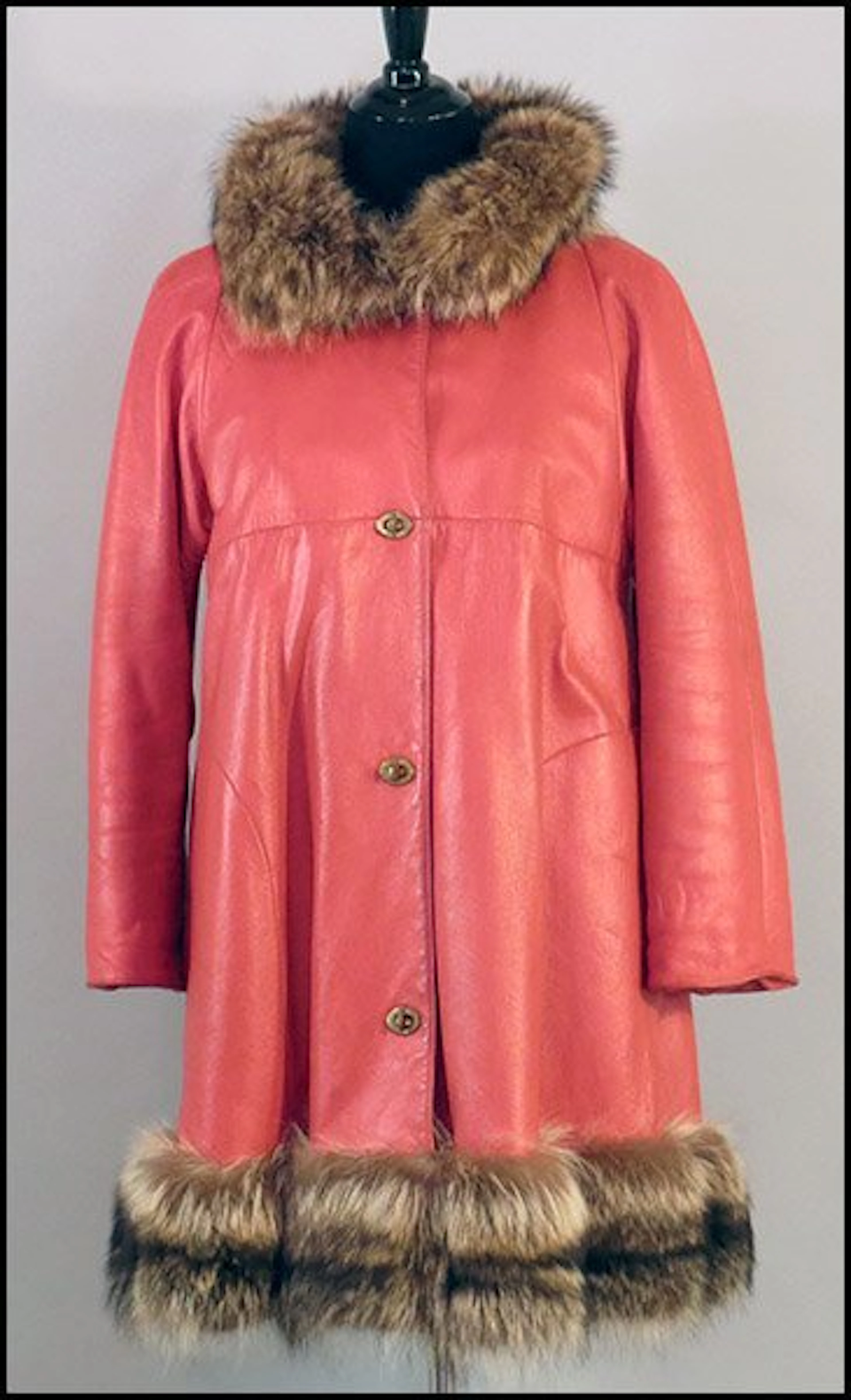 Bonnie cashin orange leather coat.