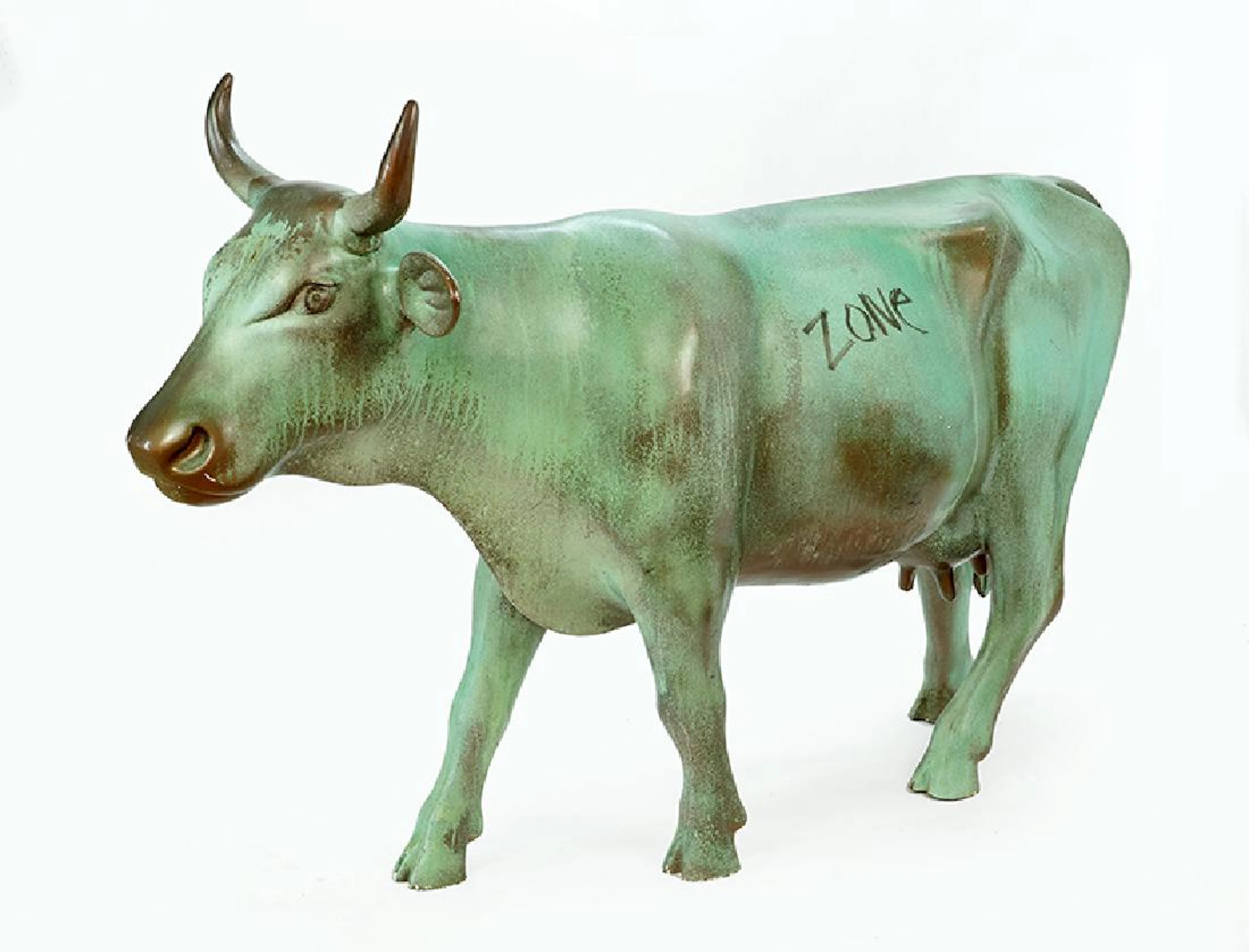 A Painted Fiberglass Cow Sculpture.