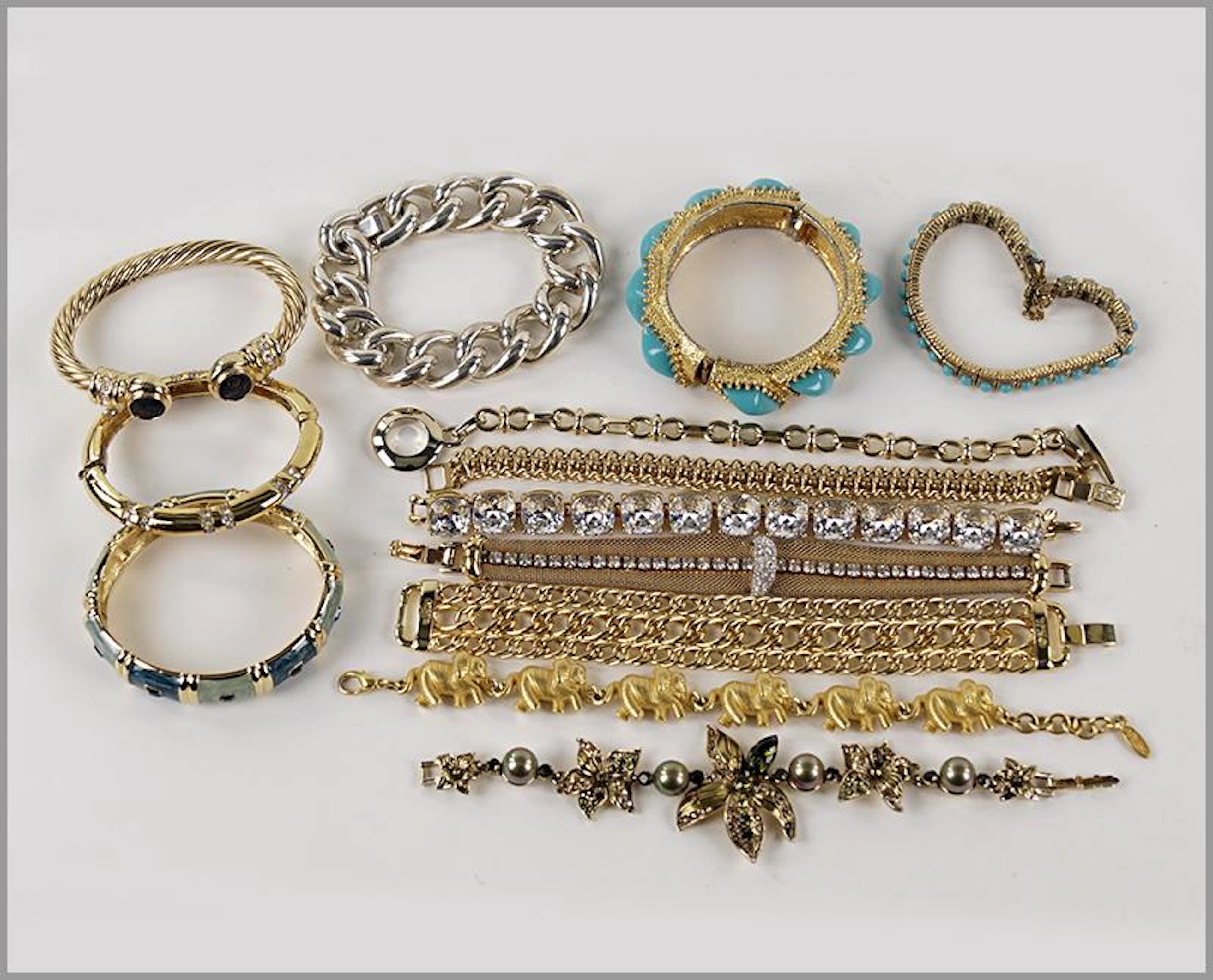 Three Kenneth Jay Lane Bracelets.