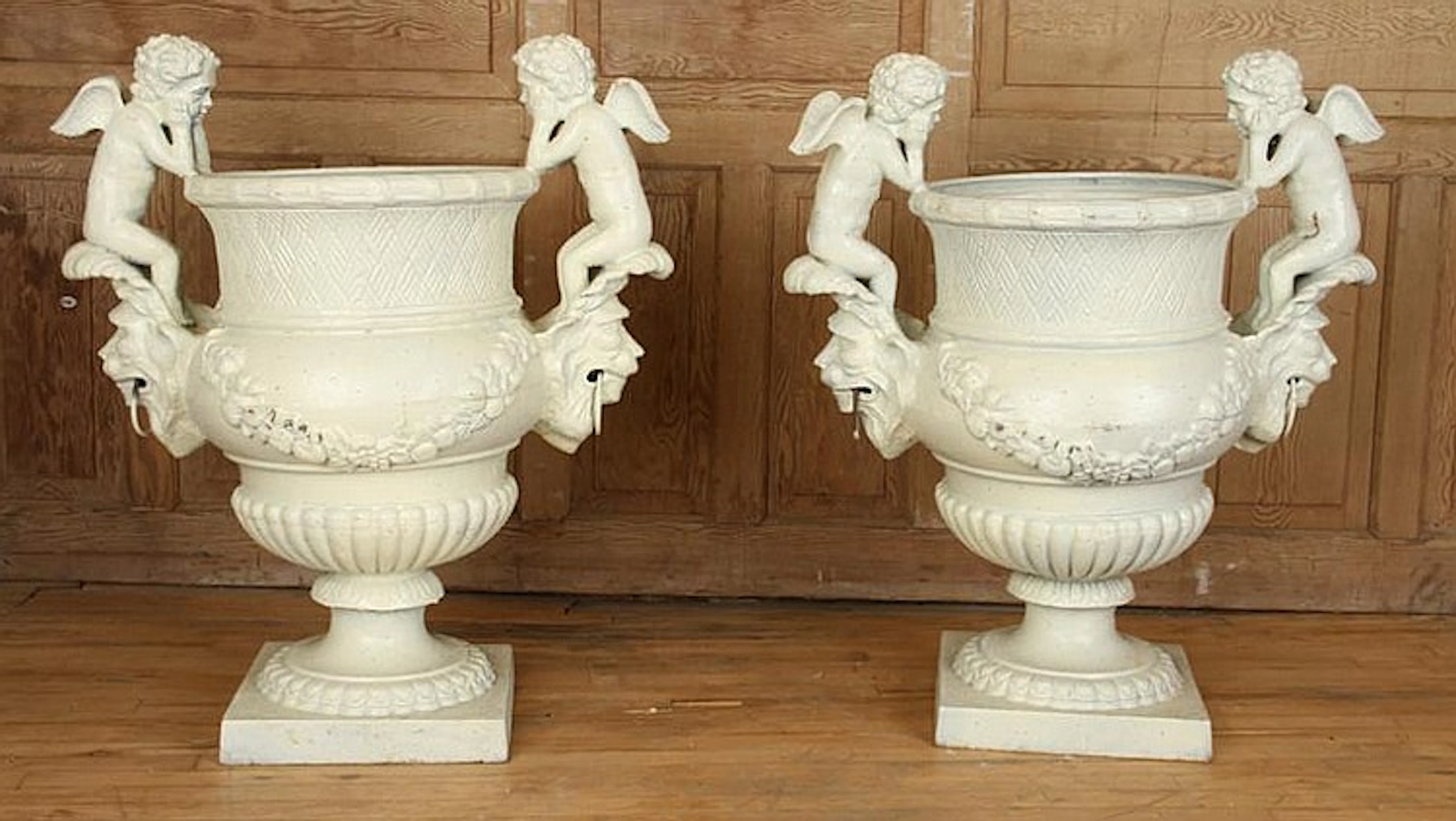 PAIR CAST IRON URNS MANNER OF CLAUDE BALLIN