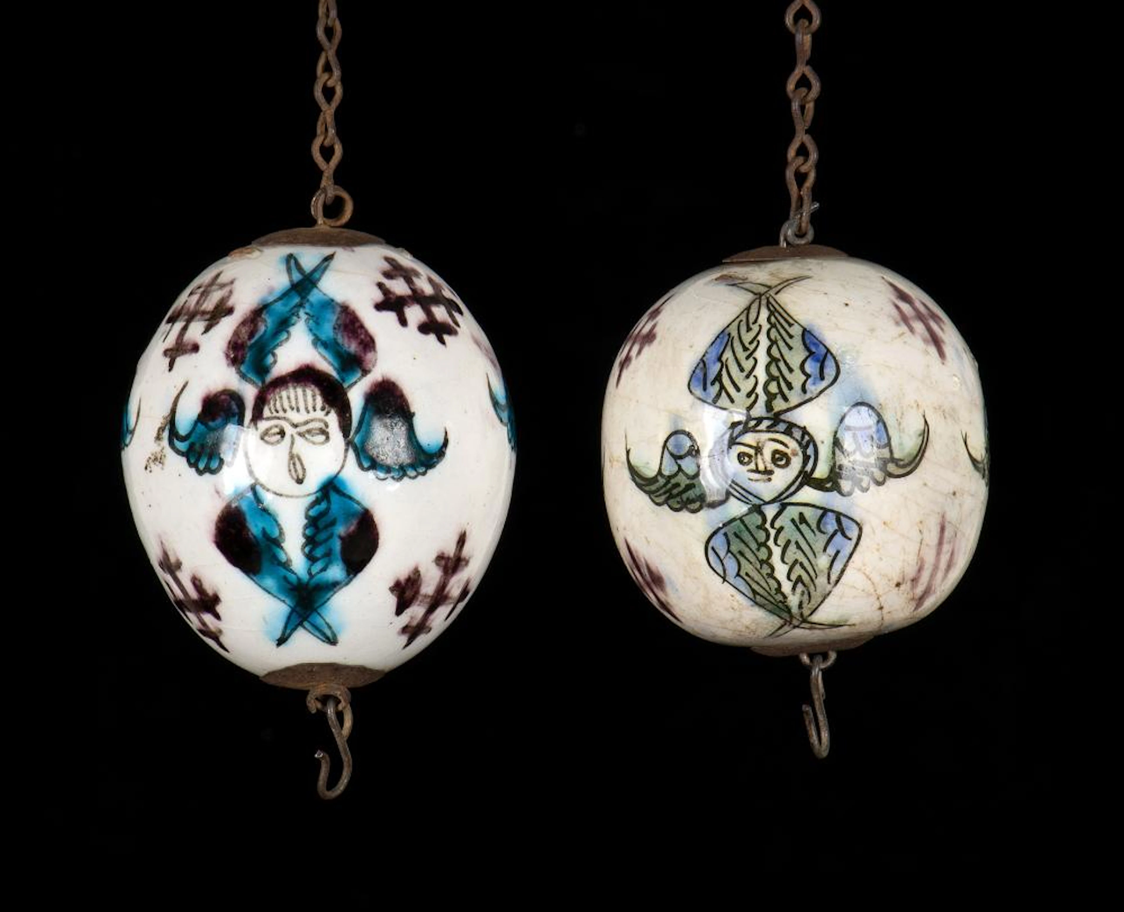 TWO 'KUTHAYA' PAINTED AND GLAZED POTTERY EGG-SHAPED...