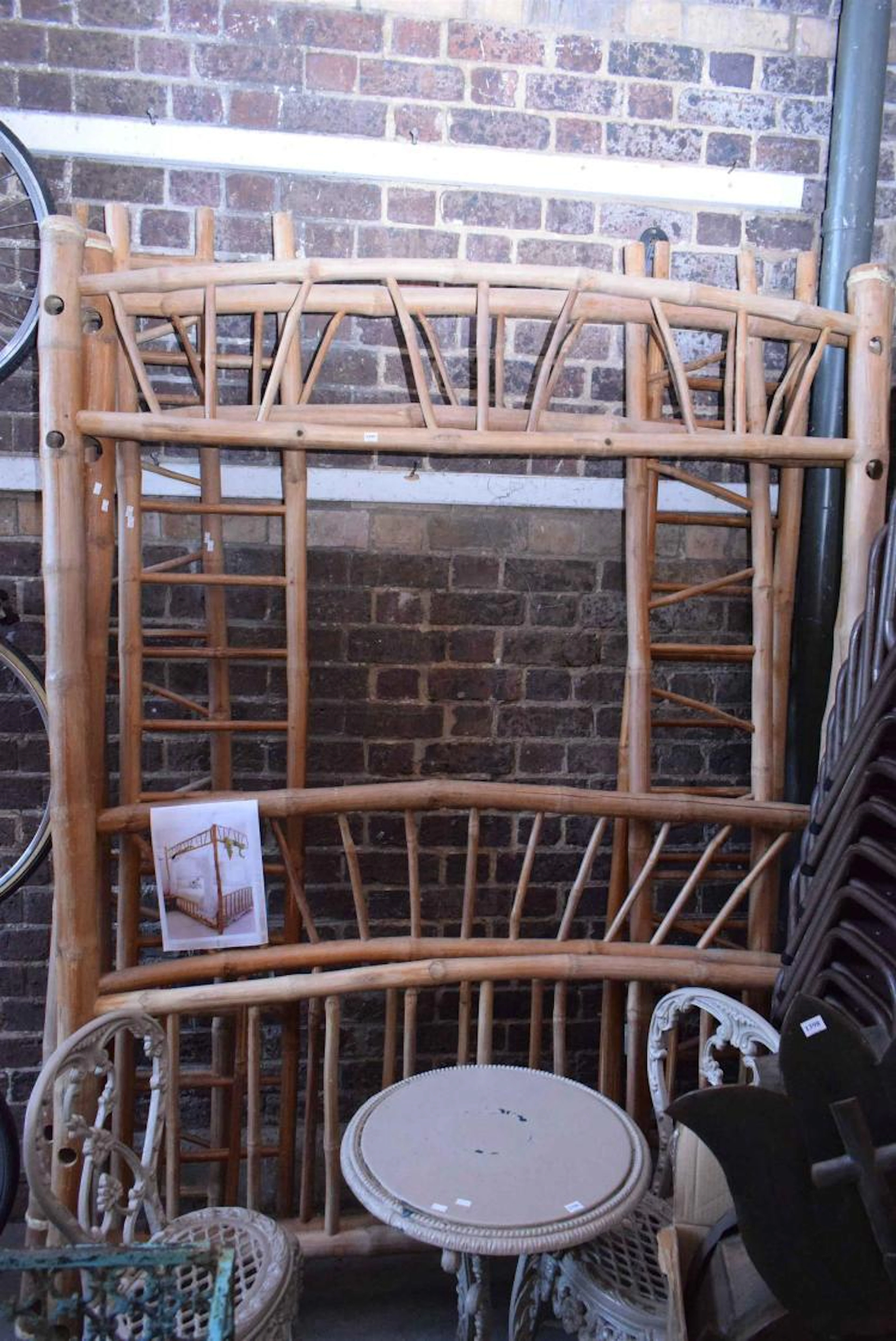 AN IMPRESSIVE BAMBOO FORMED FOUR POSTER BED