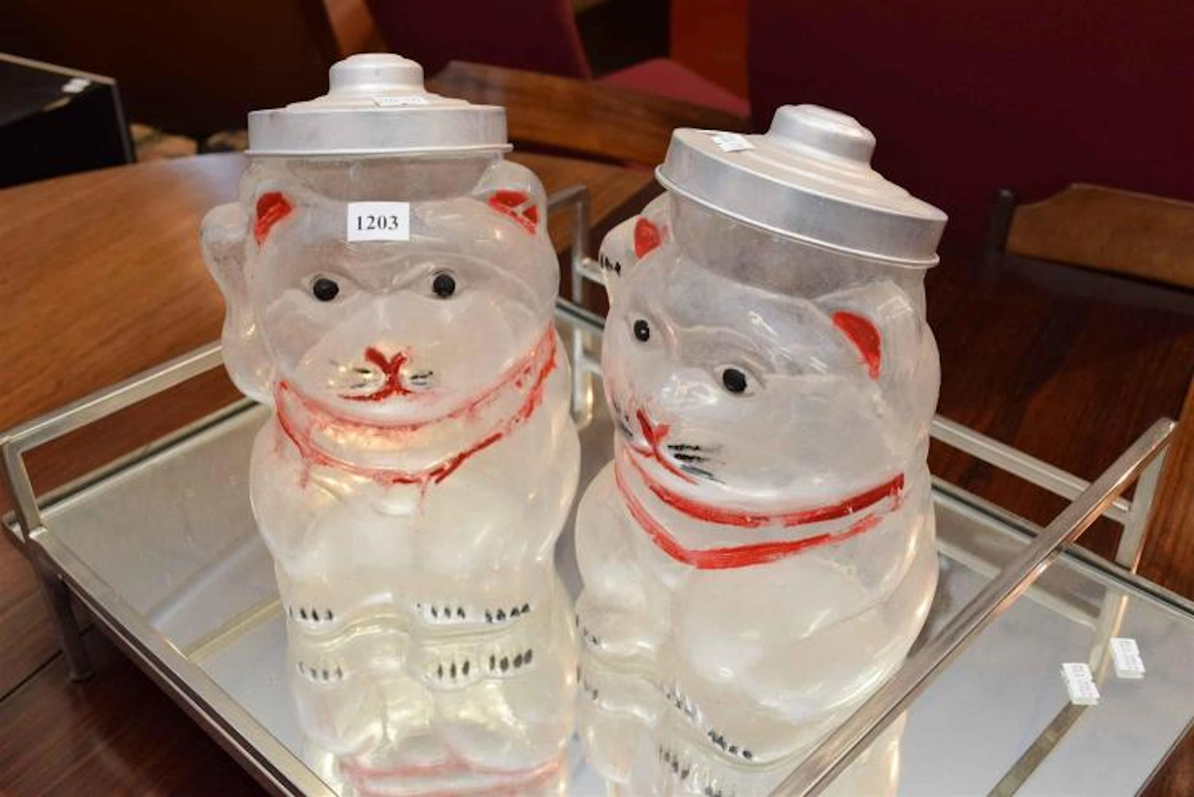 A PAIR OF GLASS HELLO KITTY JARS