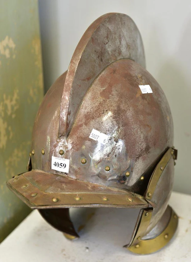 A REPRODUCTION MEDIEVAL HELMET