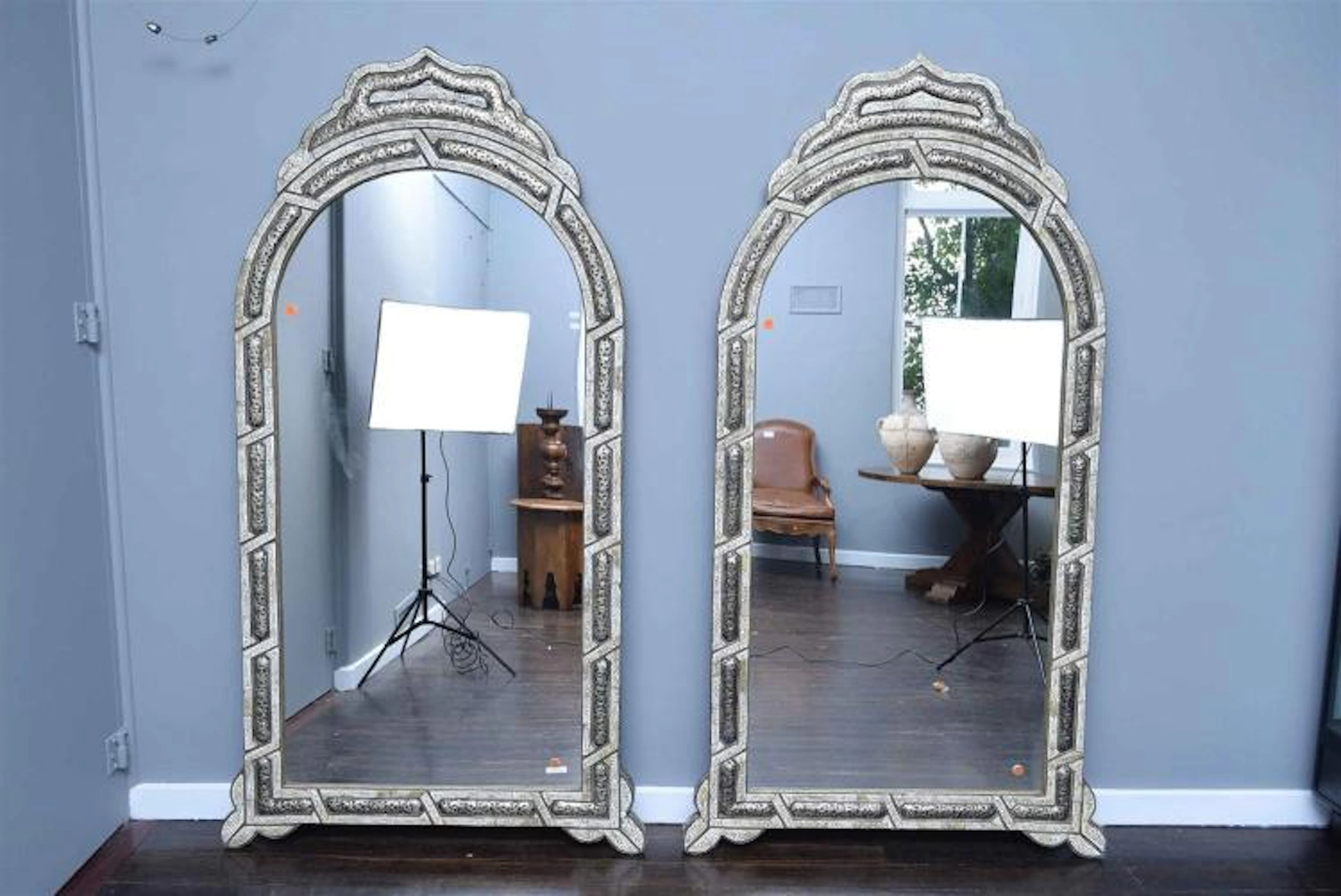 A PAIR OF BONE AND SILVER OVERLAY MOROCCAN MIRRORS h189 x w104cm