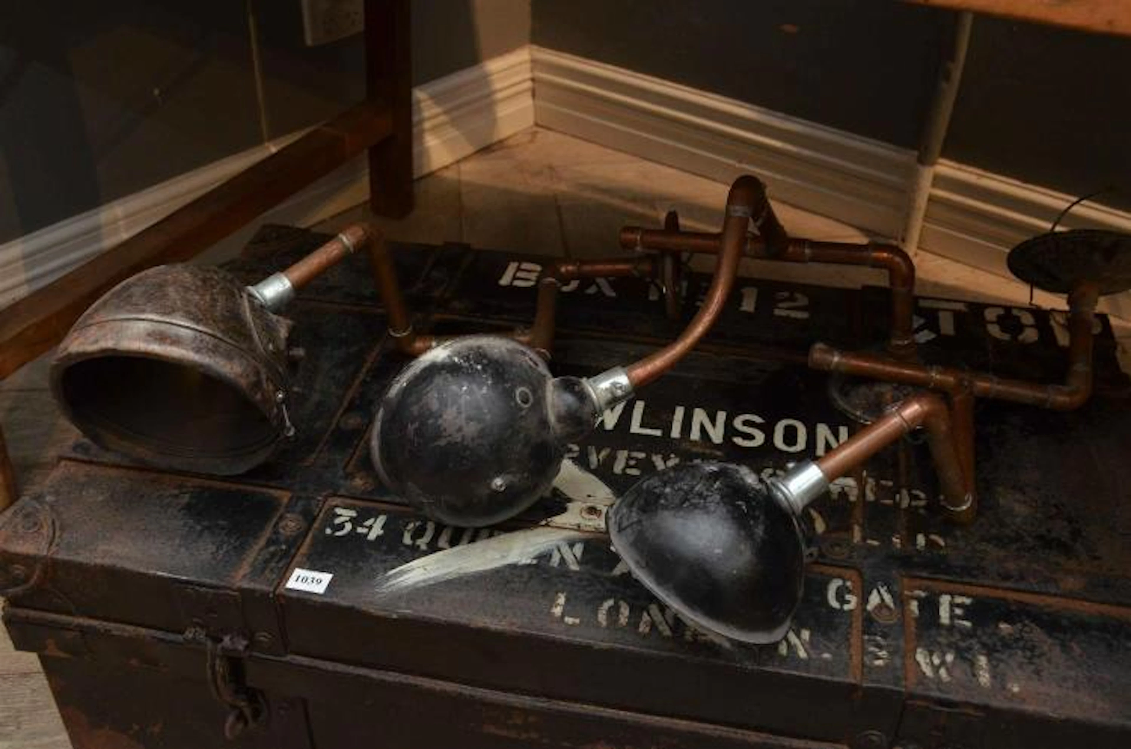 THREE INDUSTRIAL SCONCES WITH COPPER PIPING